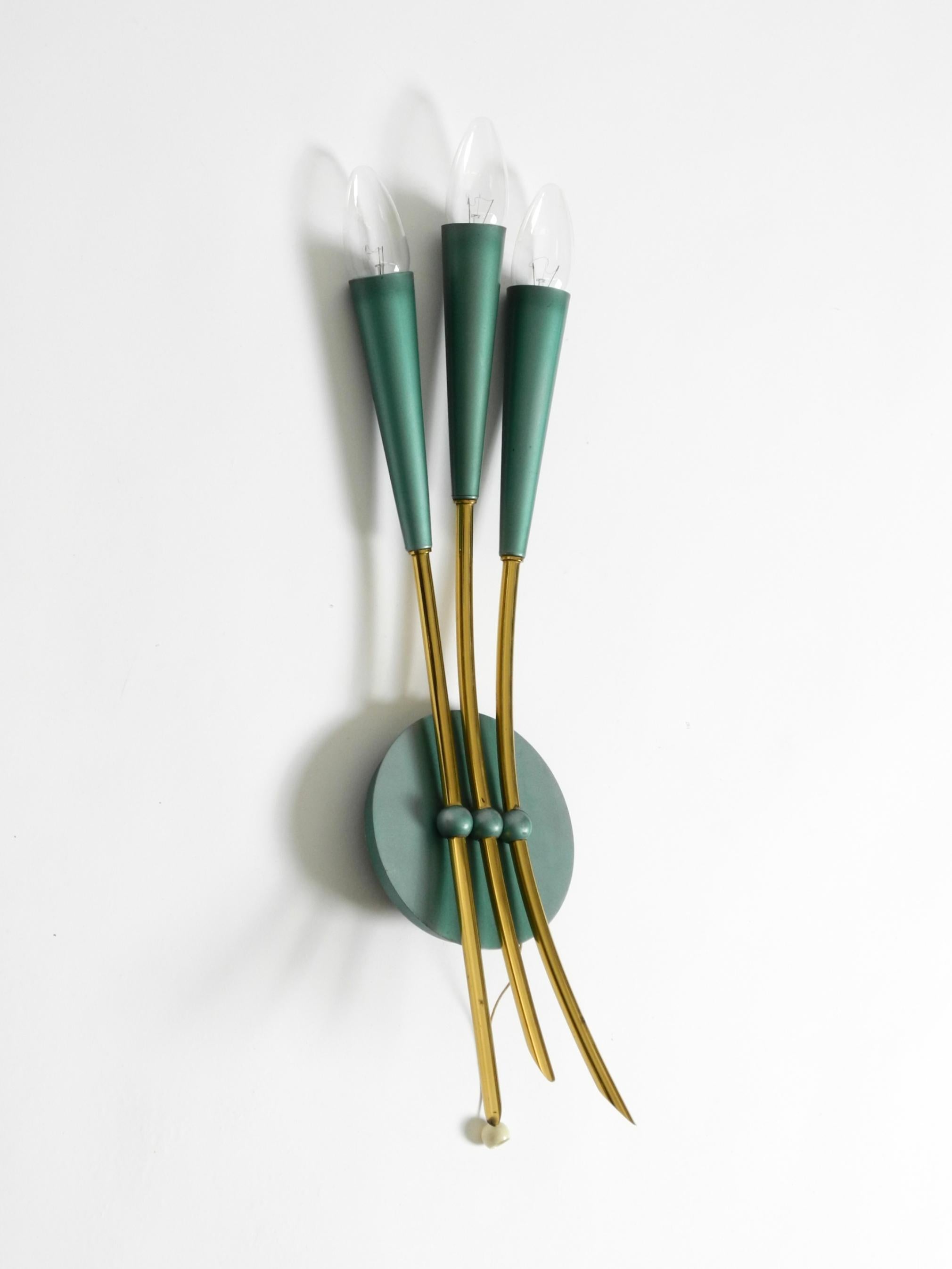 Mid-Century Modern Beautiful large Mid Century Modern 3-light cone wall lamp made of brass For Sale