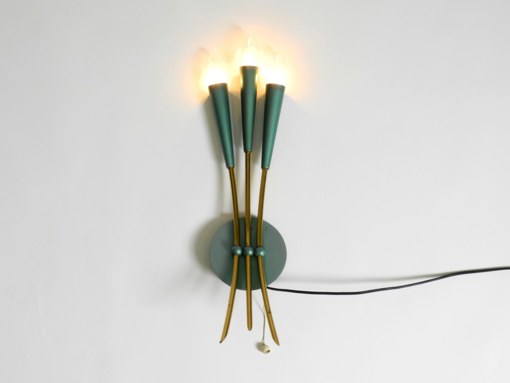 Mid-20th Century Beautiful large Mid Century Modern 3-light cone wall lamp made of brass For Sale