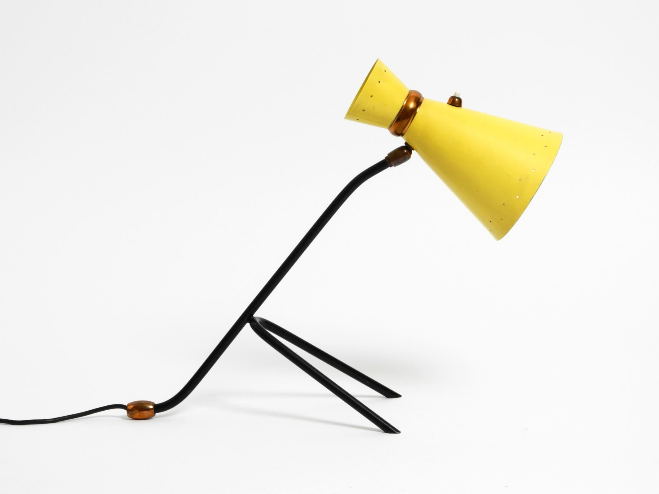 Mid-20th Century Beautiful large Mid Century tripod table lamp with yellow diabolo lampshade For Sale
