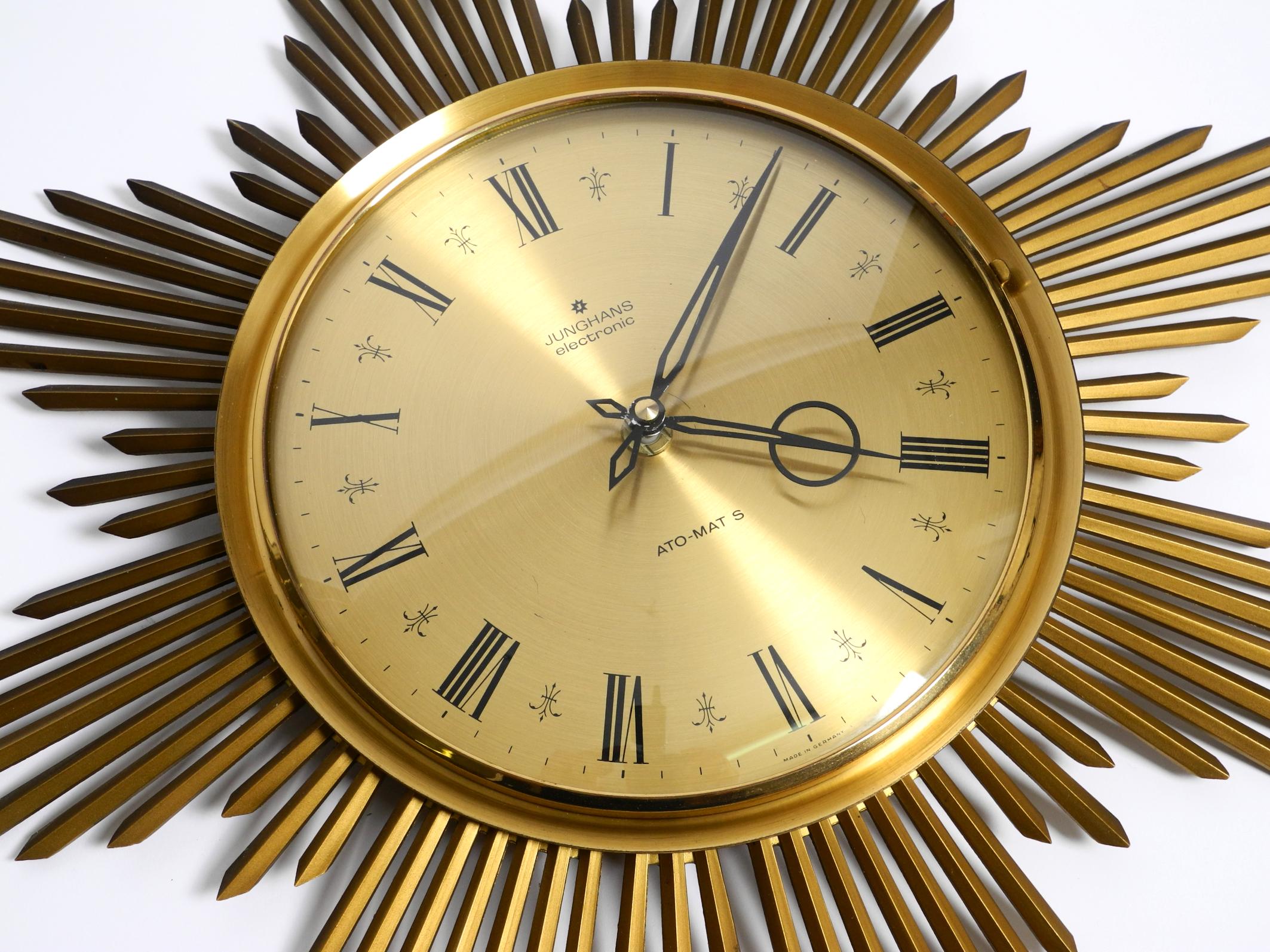 Beautiful large original 1960s brass sunburst wall clock by Junghans ATO-MAT For Sale 6