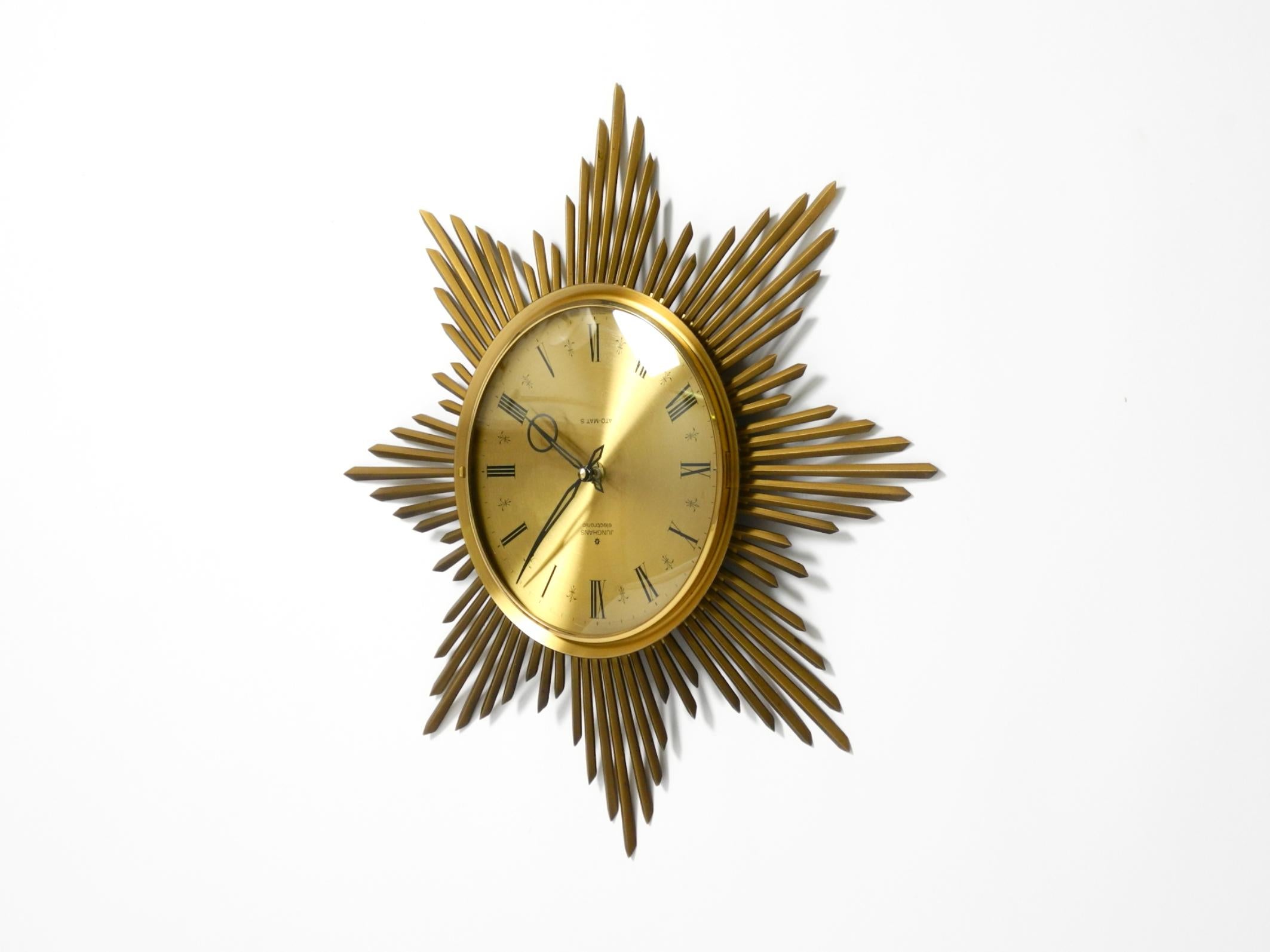 Mid-Century Modern Beautiful large original 1960s brass sunburst wall clock by Junghans ATO-MAT For Sale