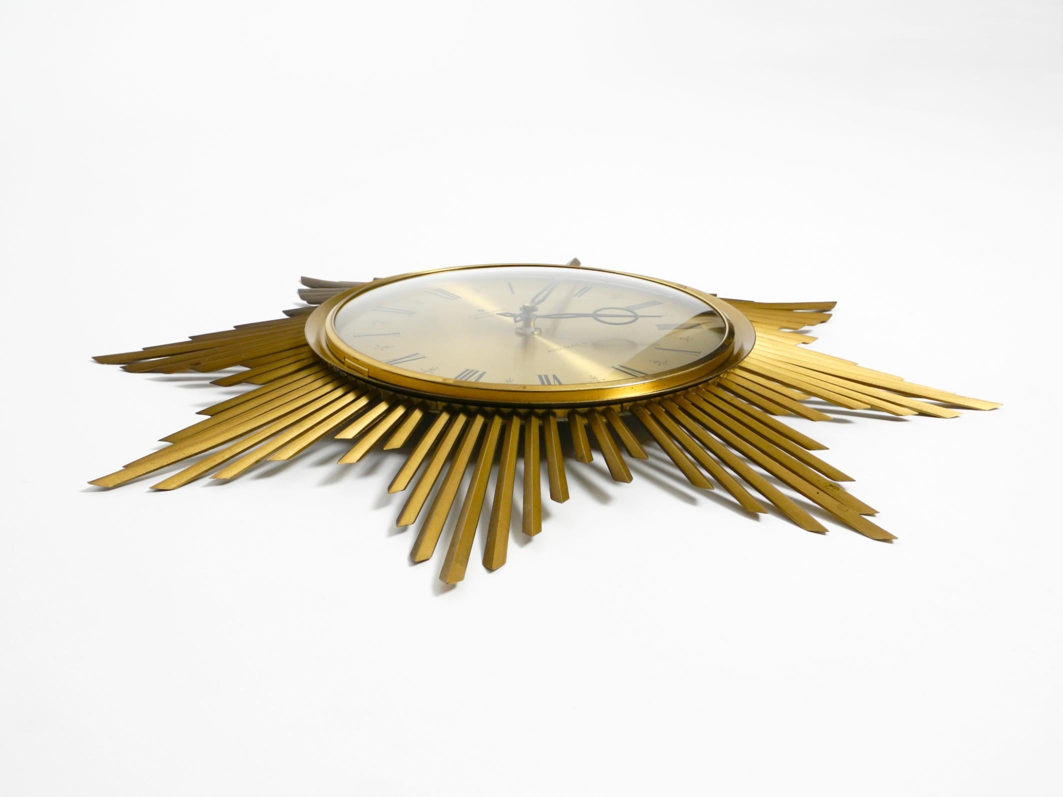Mid-20th Century Beautiful large original 1960s brass sunburst wall clock by Junghans ATO-MAT For Sale