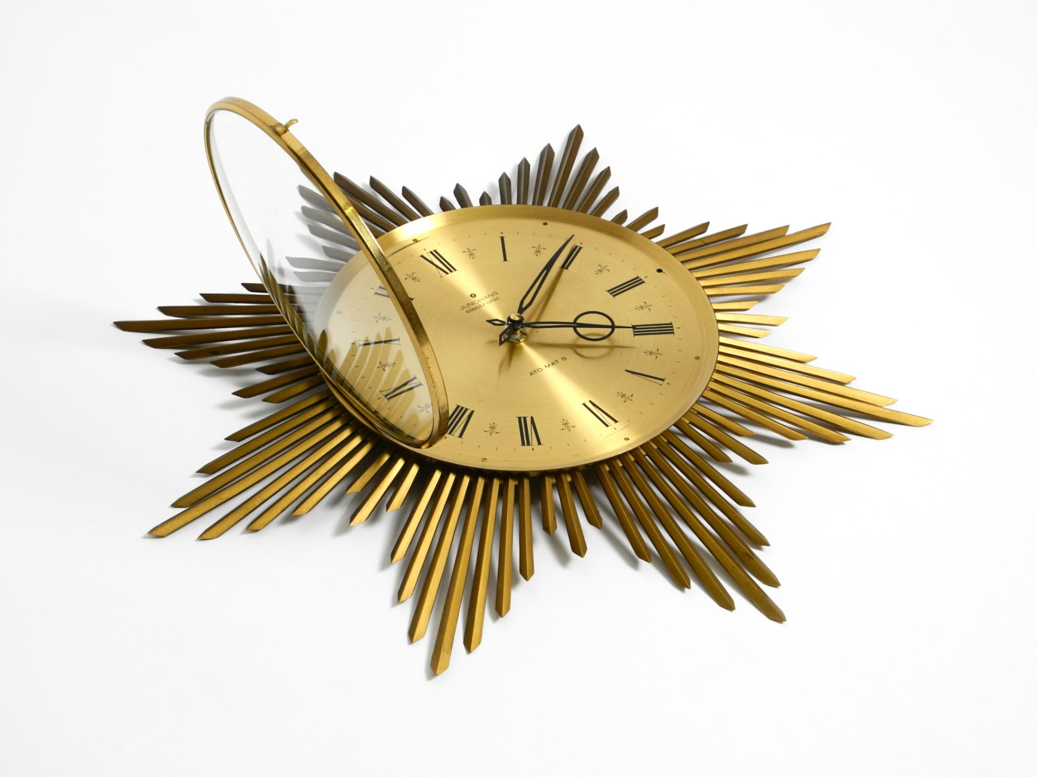 Brass Beautiful large original 1960s brass sunburst wall clock by Junghans ATO-MAT For Sale