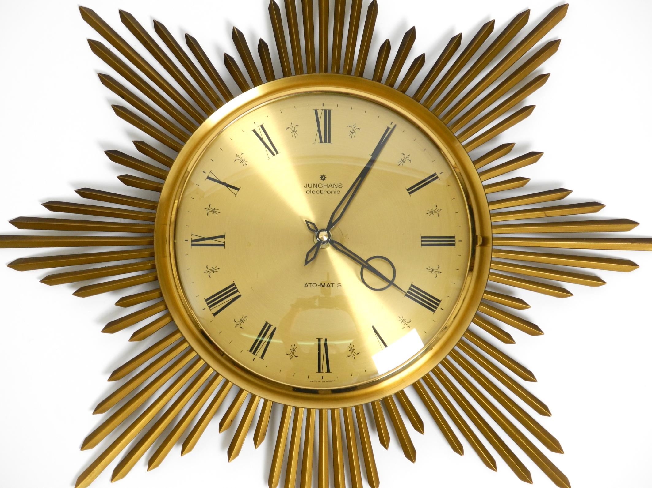 Beautiful large original 1960s brass sunburst wall clock by Junghans ATO-MAT For Sale 1