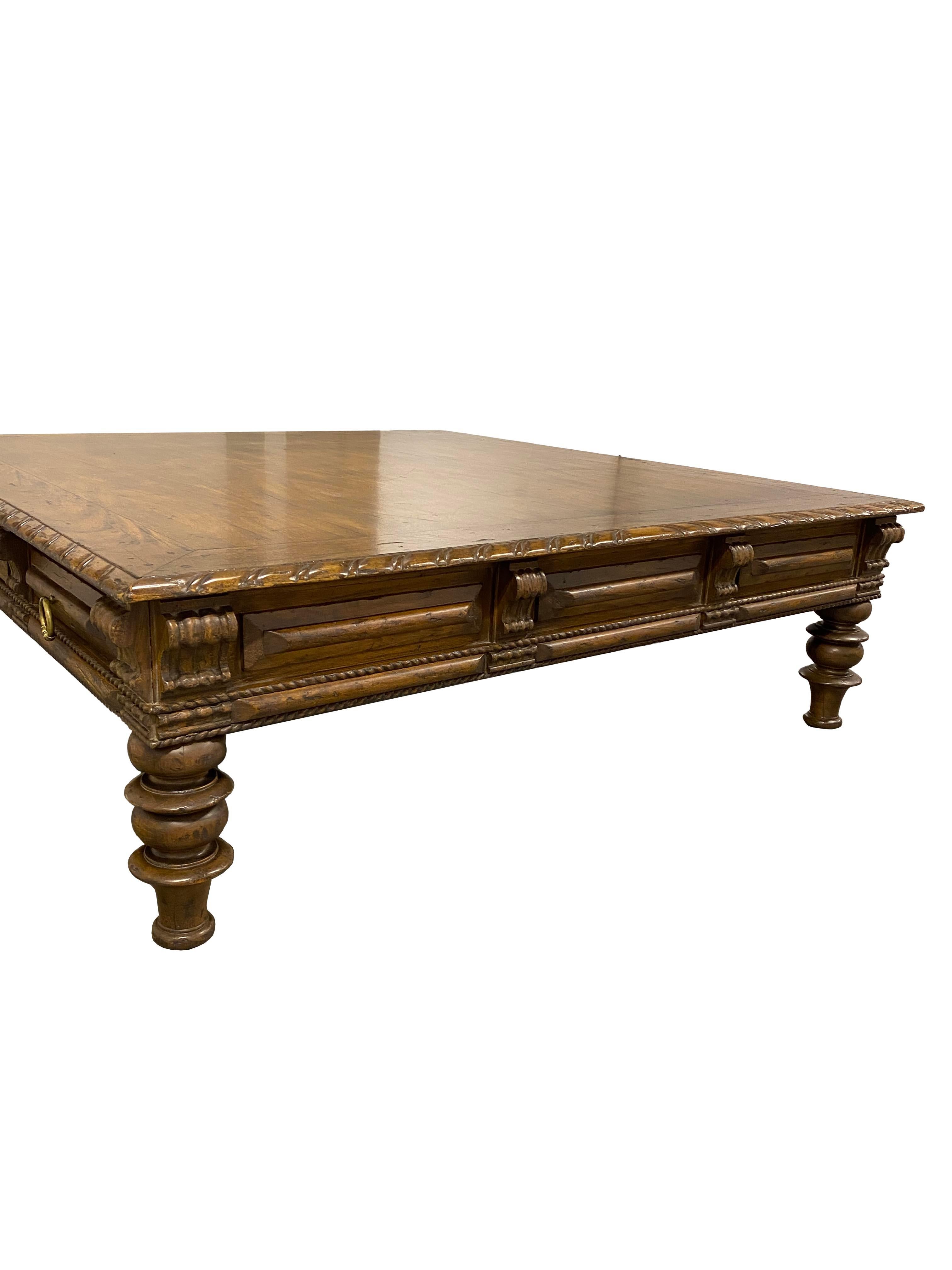 Bring old-world craftsmanship and timeless sophistication into your space with this impressive Portuguese-style coffee table, hand-made by Alfonso Marina Ebanista in 1999. Crafted in Mexico by the celebrated artisan furniture house known for its