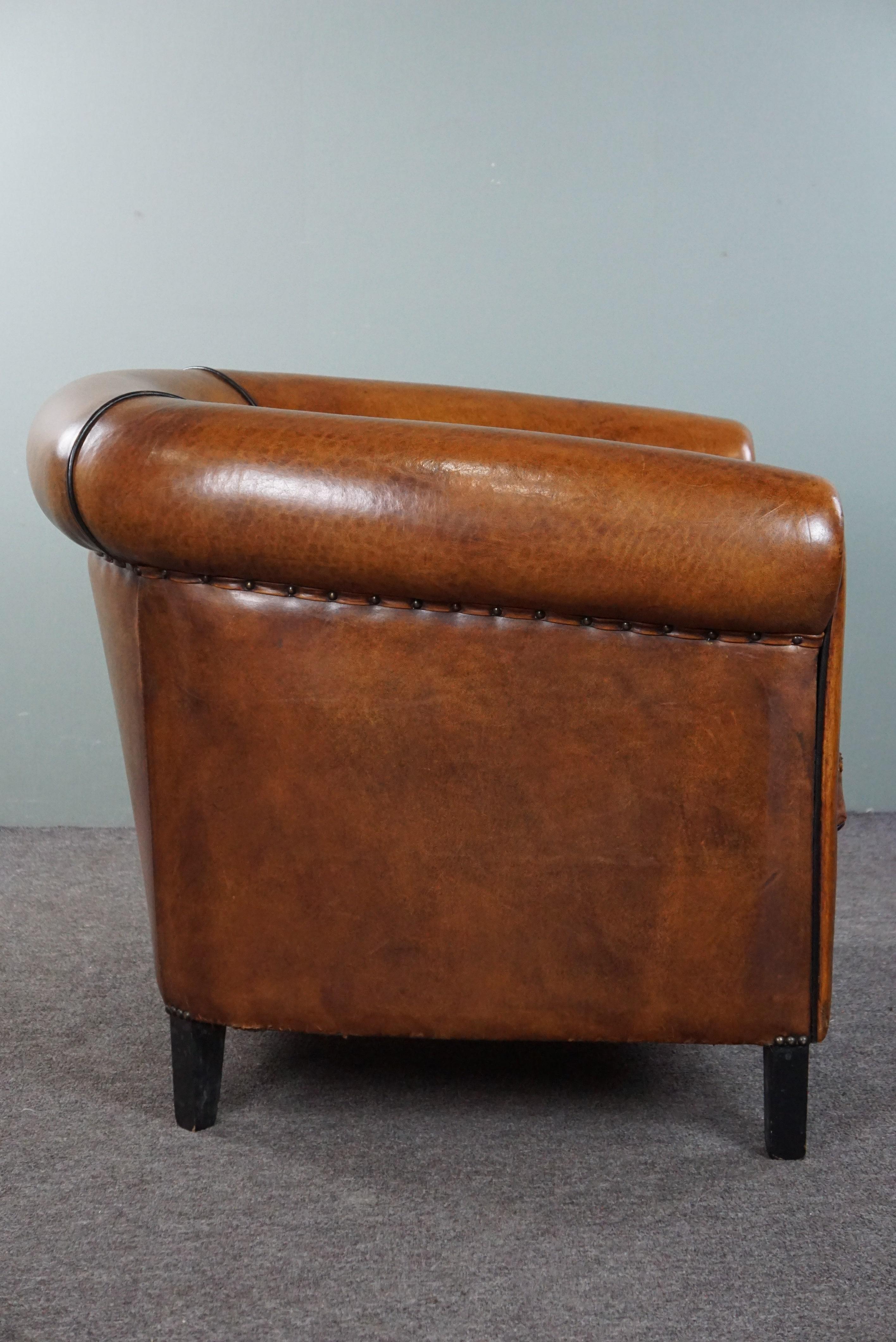 Hand-Crafted Beautiful large sheep leather club chair finished with black piping For Sale