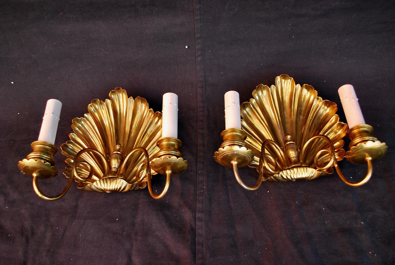 We have over three thousand antique sconces and over one thousand antique lights
A beautiful pair of solid brass late 19th century sconces, originally, they were candles, we are going to electrify them (included), you could hang them with the