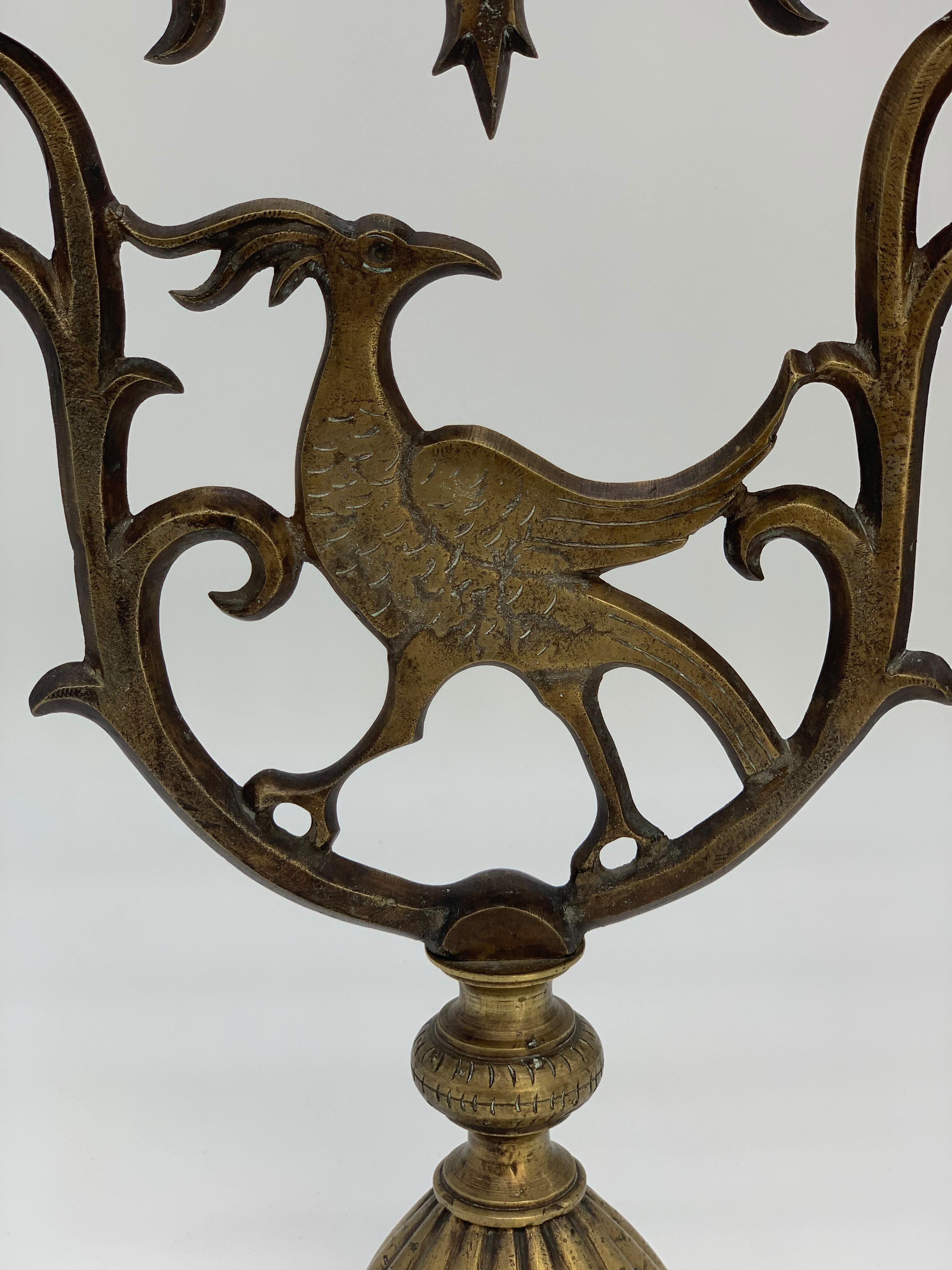 Beautiful bronze Hanukkah candleholder - each candle top can be screwed off and washed separately to get rid of left over wax.
An intricate Pheonix resides in the middle of the Hanukkah candlestick.
Beautiful table decoration,
Late 19th century.