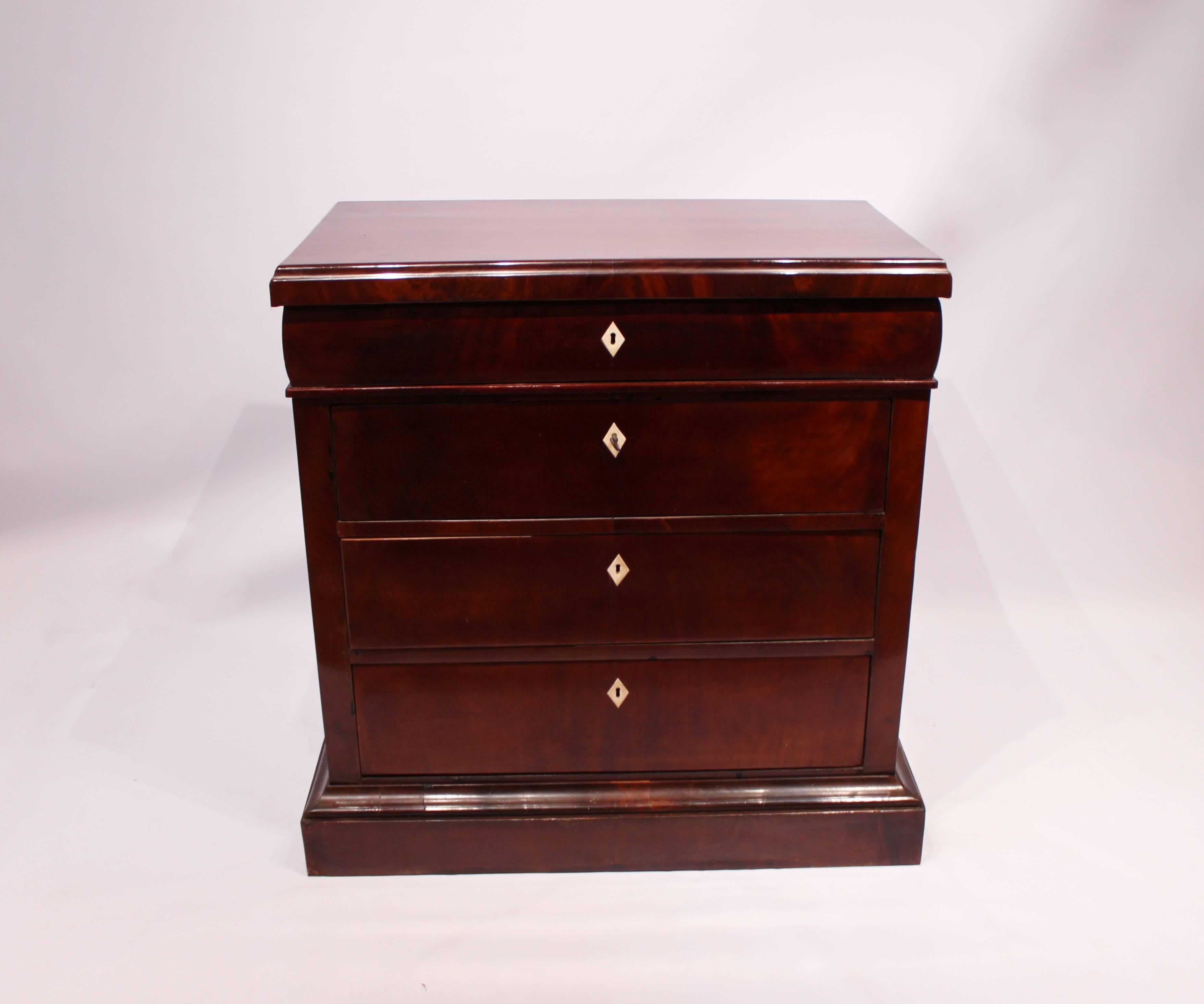 Beautiful Late Empire chest of drawers in polished mahogany from circa 1840s. The chest is in great vintage condition.