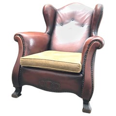 Magnifique chaise longue en cuir et laiton cloutée des années 1930