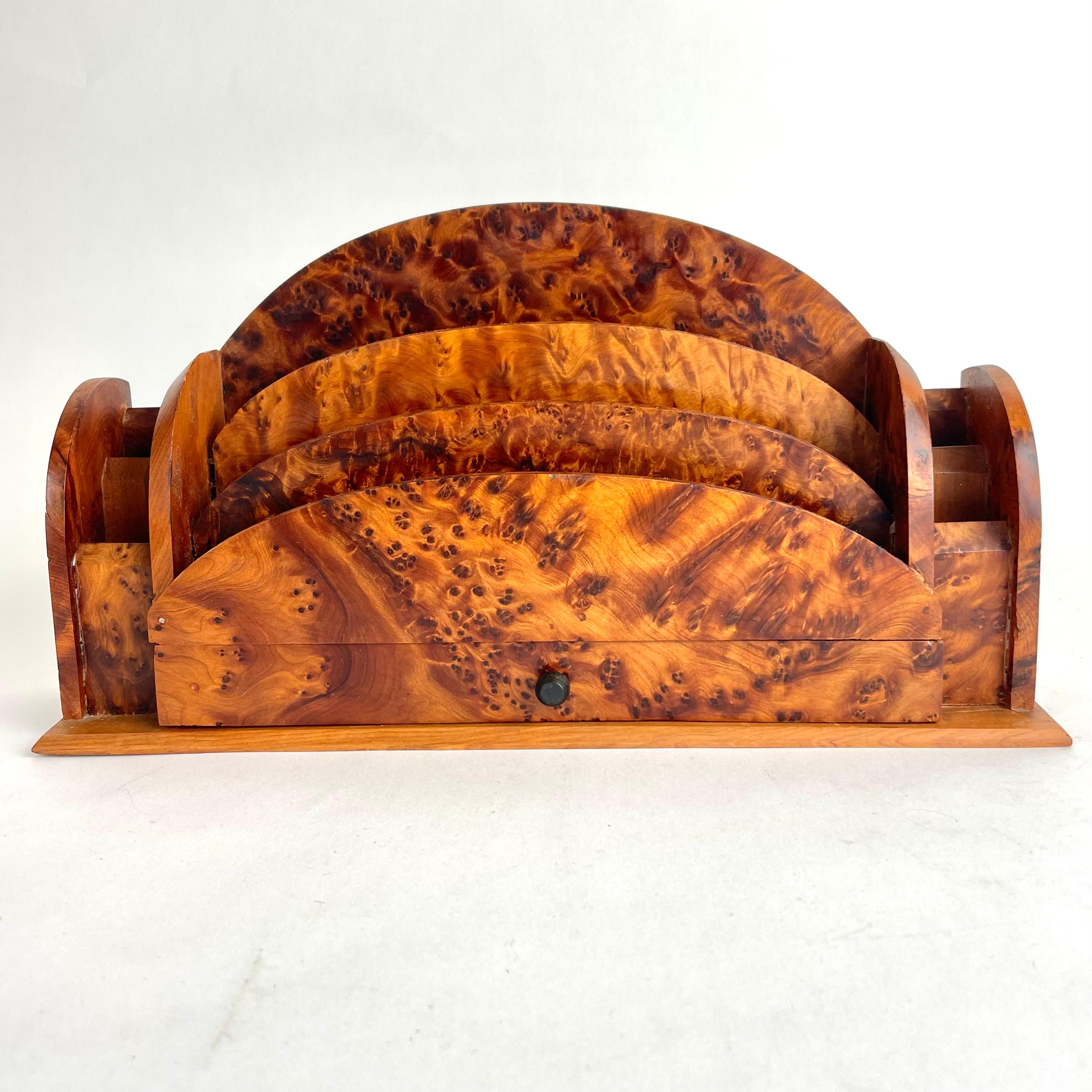 A Beautiful Letter Stand with Thuja burl from the 1930s. Very period Art Deco design. The letter stand designed with a drawer, rack for letters and pens.

Wear consistent with age and use 