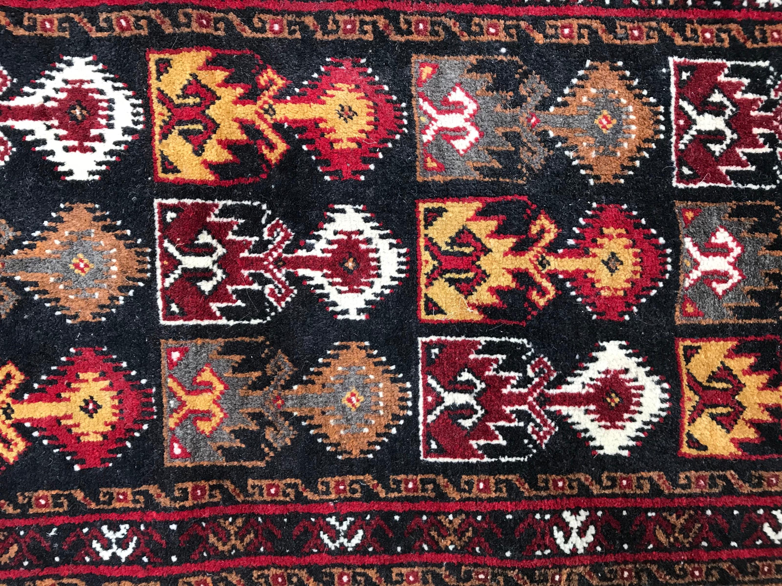 Nice Afghan Baluch rug with beautiful design and colors, entirely hand knotted with wool velvet on wool foundation.