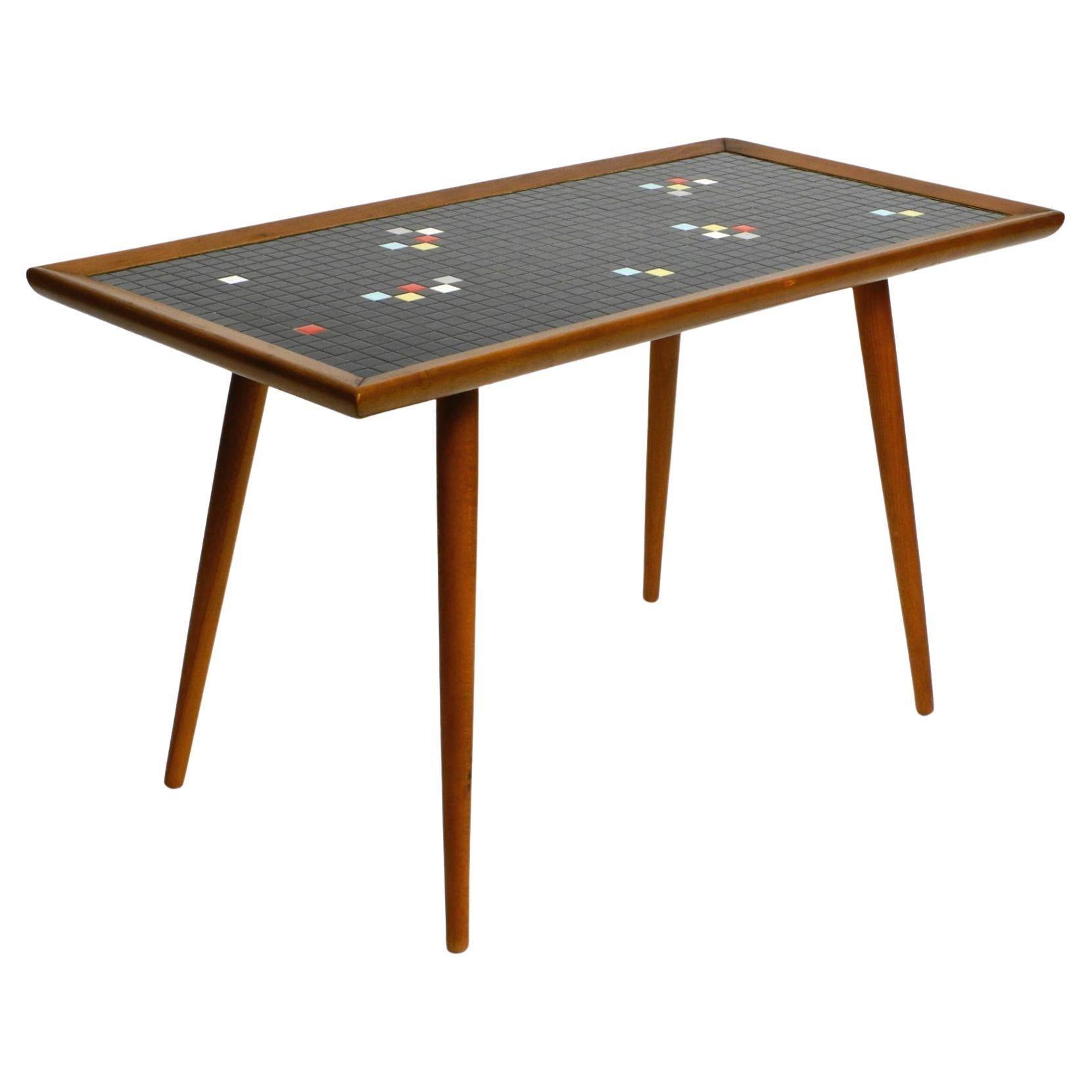 Beautiful long Mid Century walnut wood coffee table with a mosaic surface