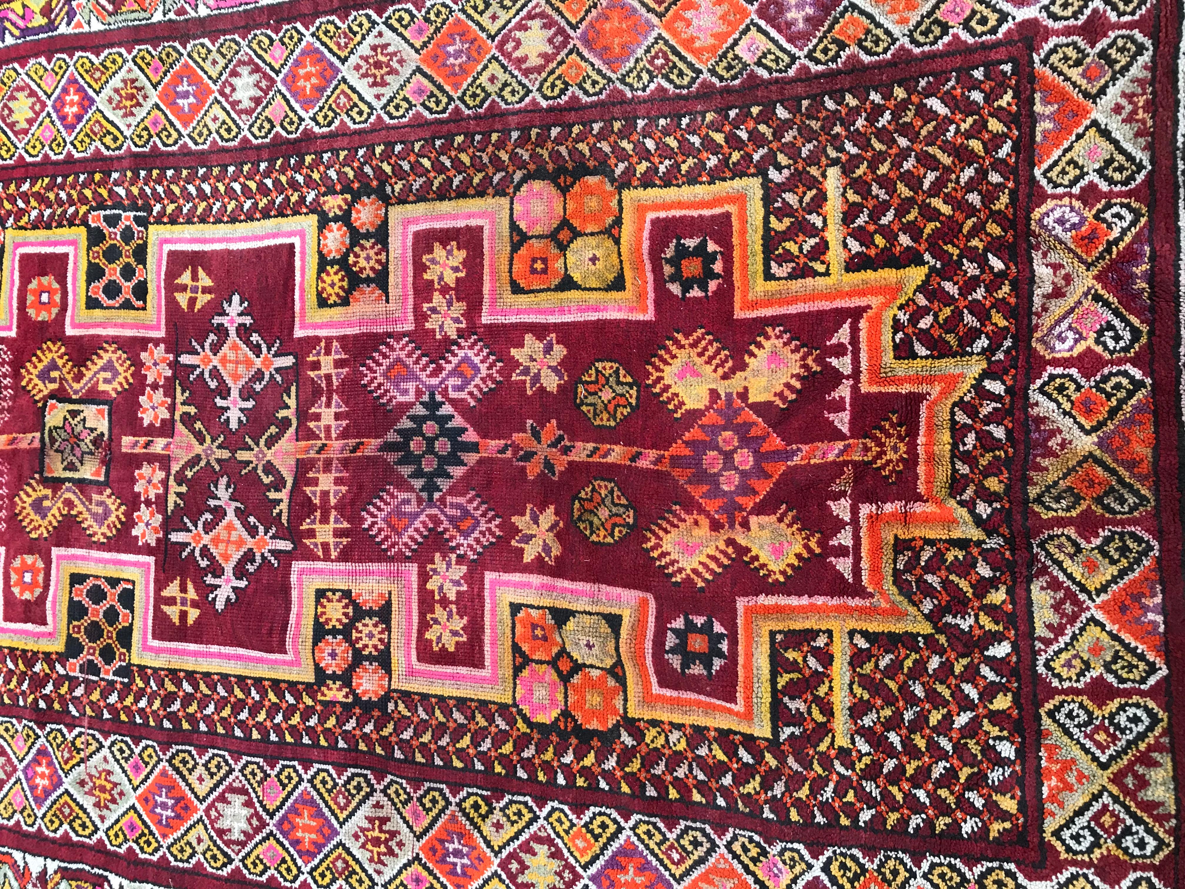 Nice vintage Moroccan runner, with beautiful colors and a geometrical tribal design, entirely hand knotted with wool velvet on wool foundation.
    