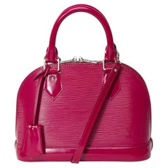 Beautiful Louis Vuitton Alma BB handbag strap in Fuchsia épi leather, SHW