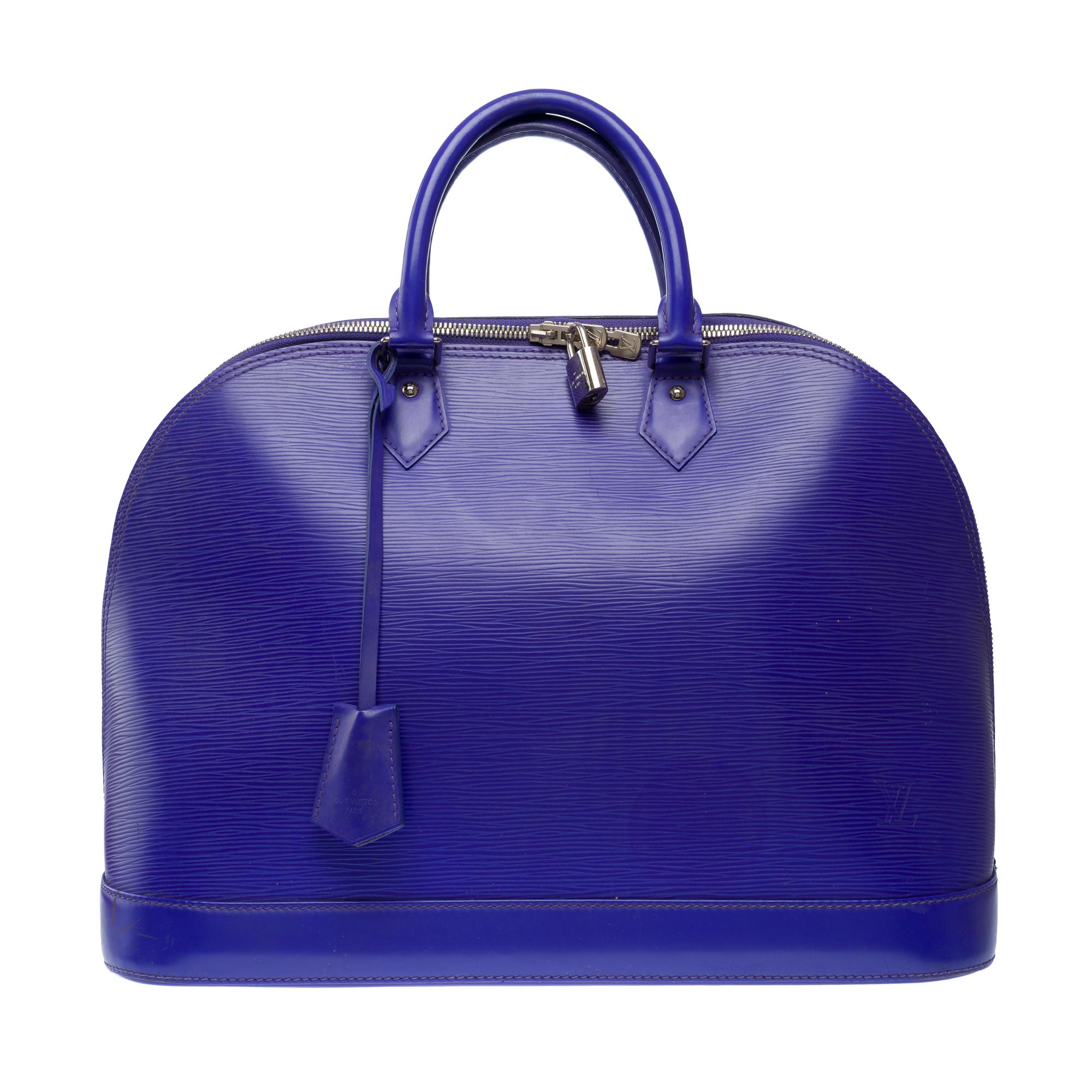 Very​ ​Chic​ ​Louis​ ​Vuitton​ ​Alma​ ​GM​ ​handbag​ ​in​ ​Fig​ ​epi​ ​leather​ ​,​ ​silver​ ​metal​ ​trim,​ ​double​ ​handle​ ​in​ ​purple​ ​leather​ ​for​ ​hand​ ​carry

Double​ ​zip
Inner​ ​lining​ ​in​ ​purple​ ​suede,​ ​a​ ​double​ ​patch​