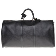 Beautiful Louis Vuitton Keepall 50 travel bag in black épi leather