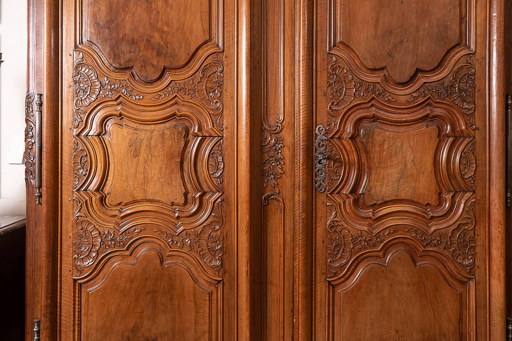 Beautifully carved 18th century. Walnut armoire.