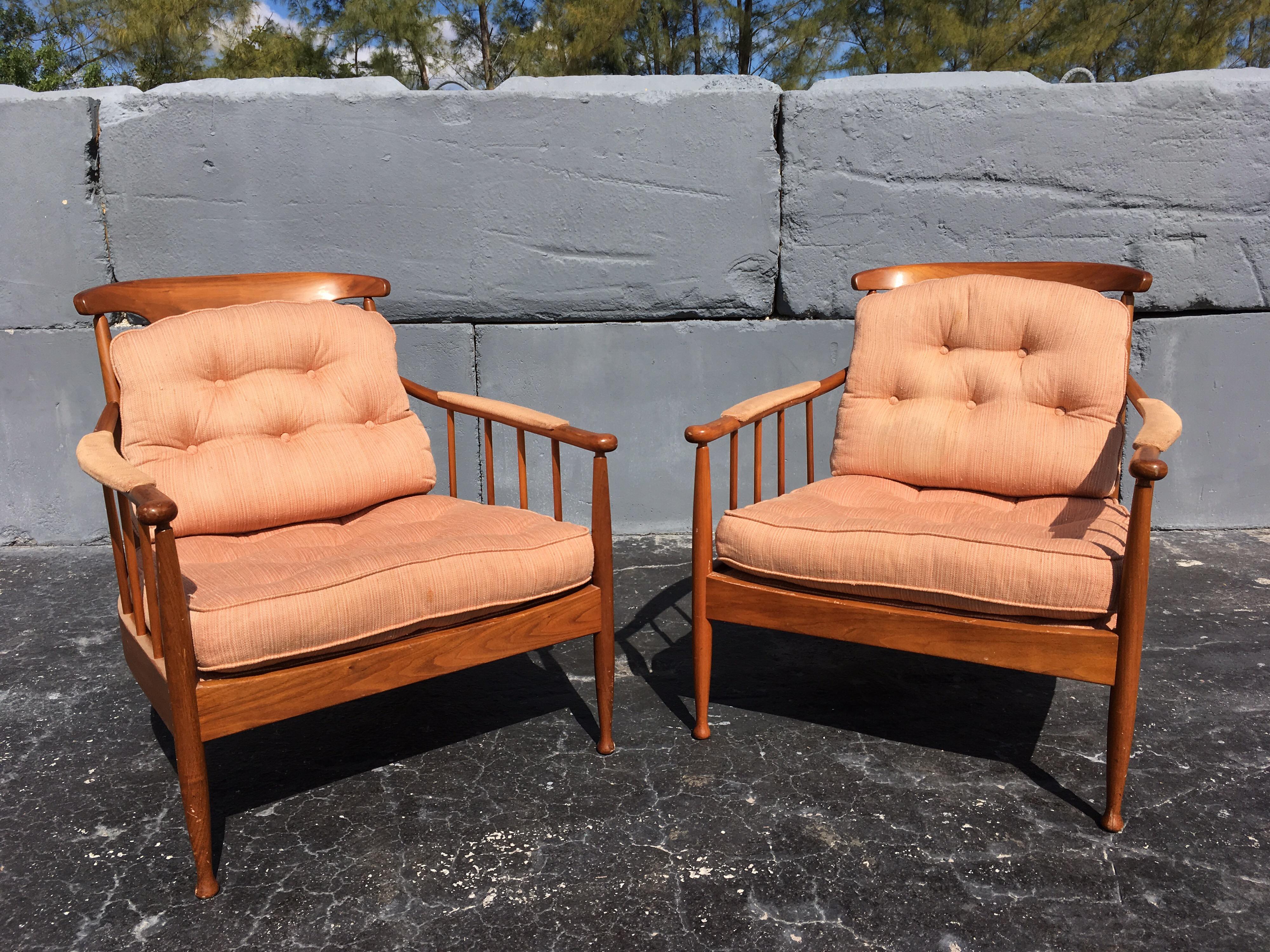 We will refinish the wood frames and they will be in excellent condition. The fabric cushions need to be recovered, we can help.... we work with the best in town. Price is for the pair.