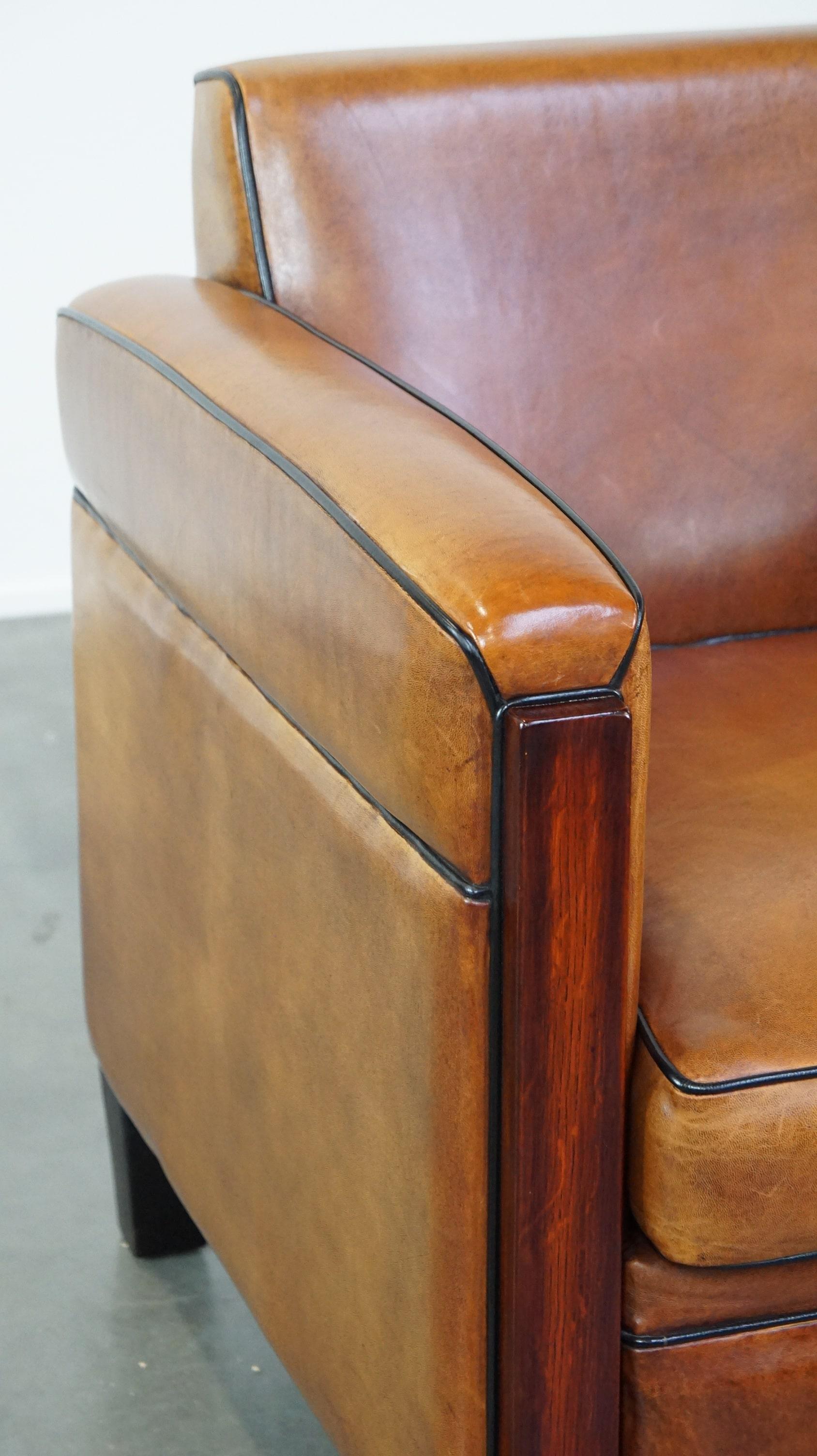 Beautiful, luxurious sheepskin armchair in Art Deco style with wooden details 4