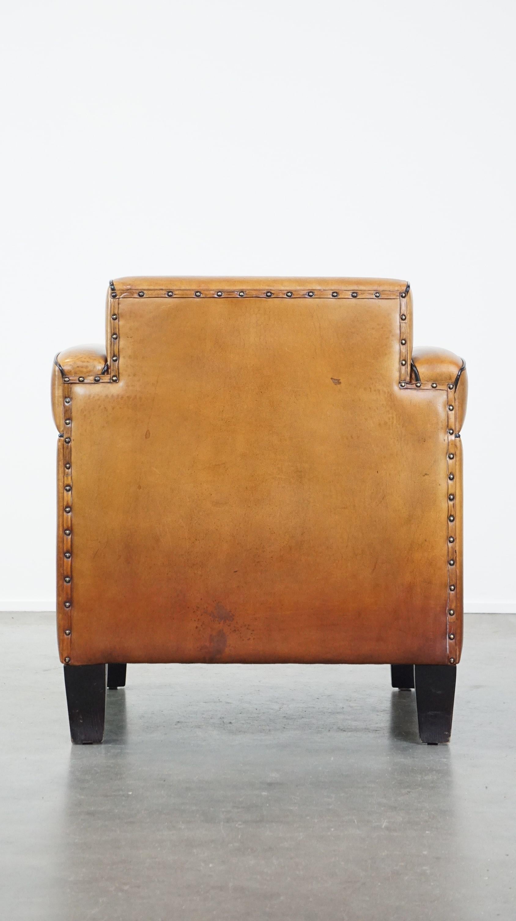 Beautiful, luxurious sheepskin armchair in Art Deco style with wooden details In Good Condition In Harderwijk, NL