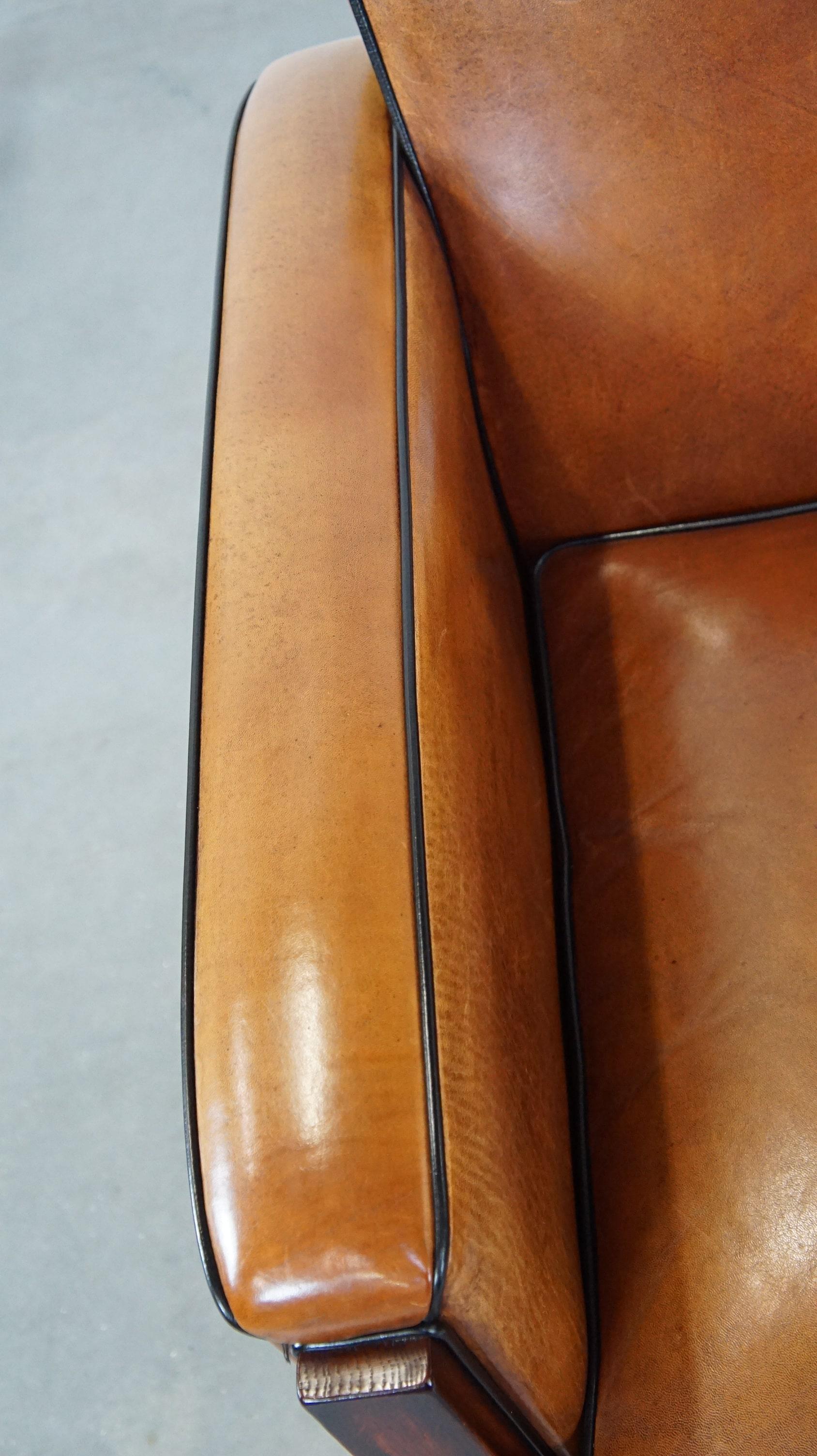 Beautiful, luxurious sheepskin armchair in Art Deco style with wooden details 1