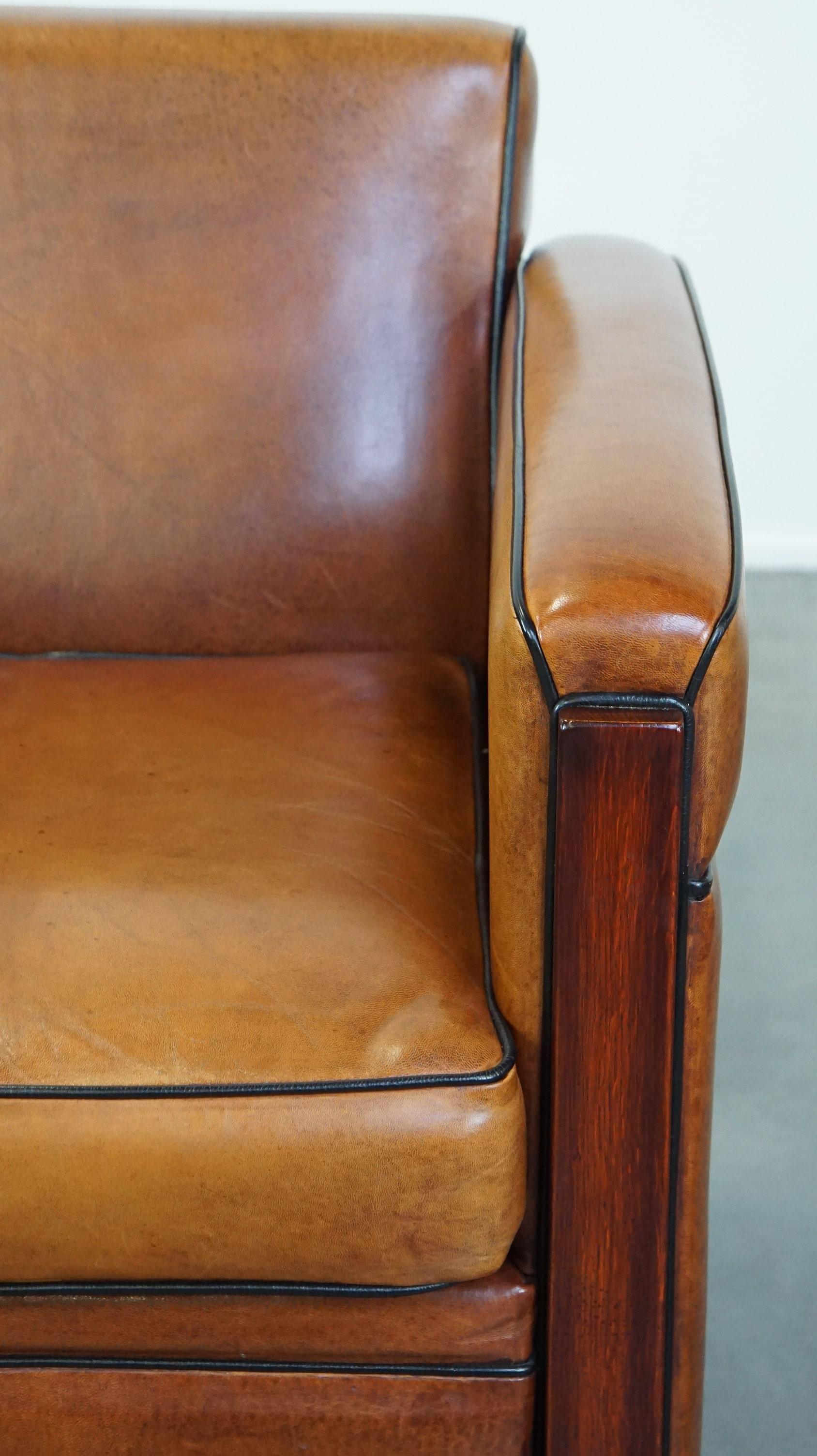 Beautiful, luxurious sheepskin armchair in Art Deco style with wooden details 3