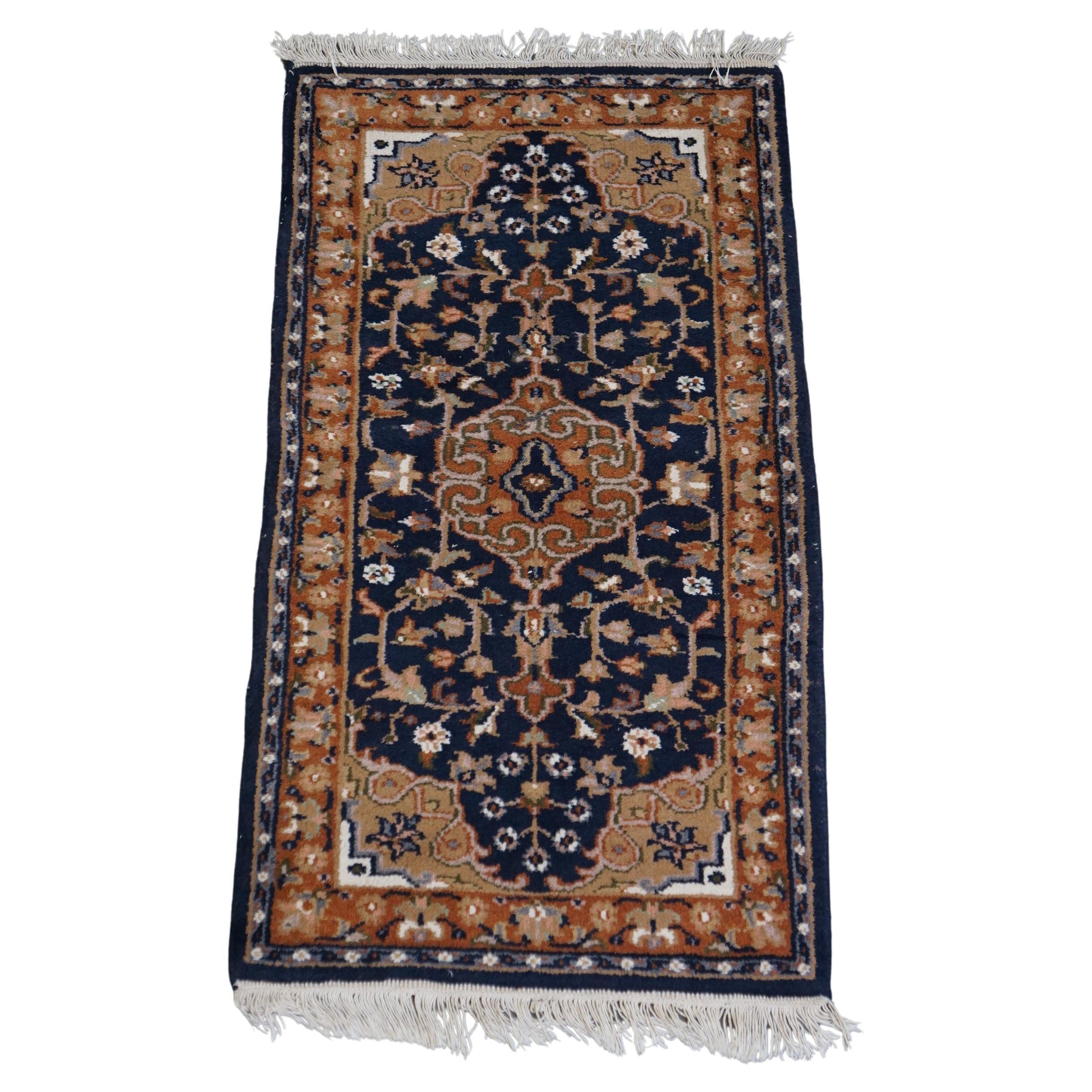 Beautiful mainly brown and blue tinted oriental rug 136x70cm
