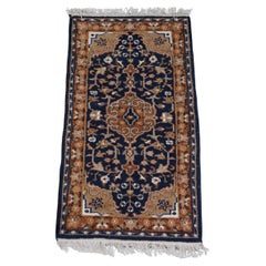 Beautiful mainly brown and blue tinted oriental rug 136x70cm