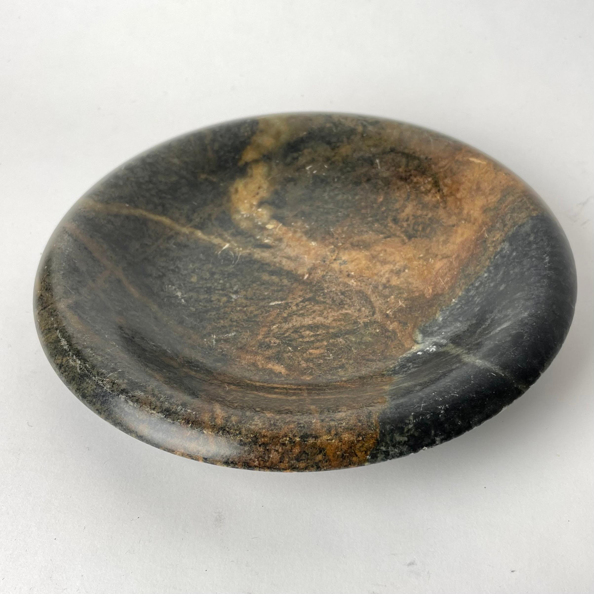 Charming Marble Bowl from early 19th Century in soft colours. Beautiful patina after 200 years of use. Small damage to the edge (see picture) but nothing that disturbs in my opinion.

Wear consistent with age and use 
