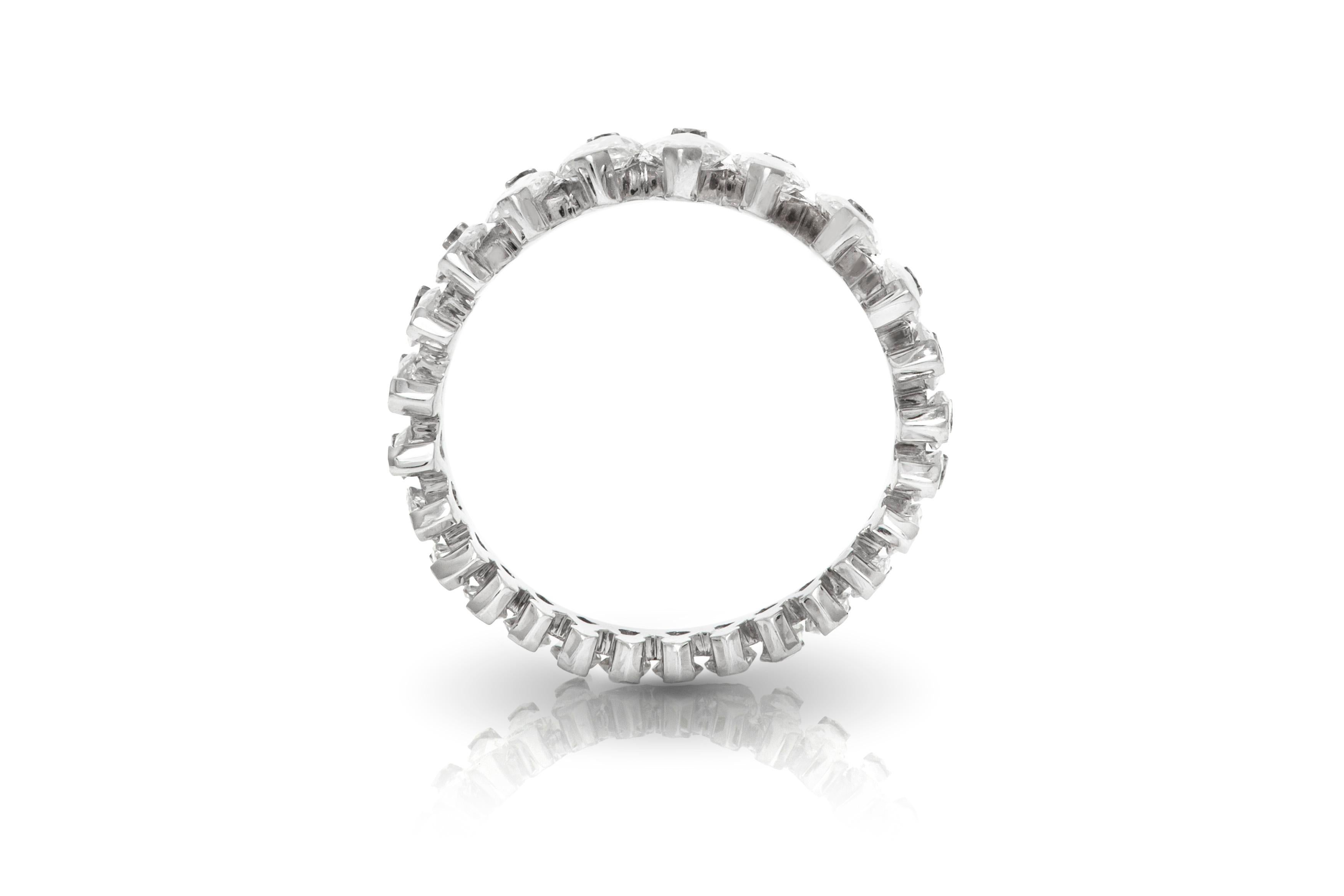 The wedding band is finely crafted in platinum with diamonds weighing approximately total of 5.00 carat.