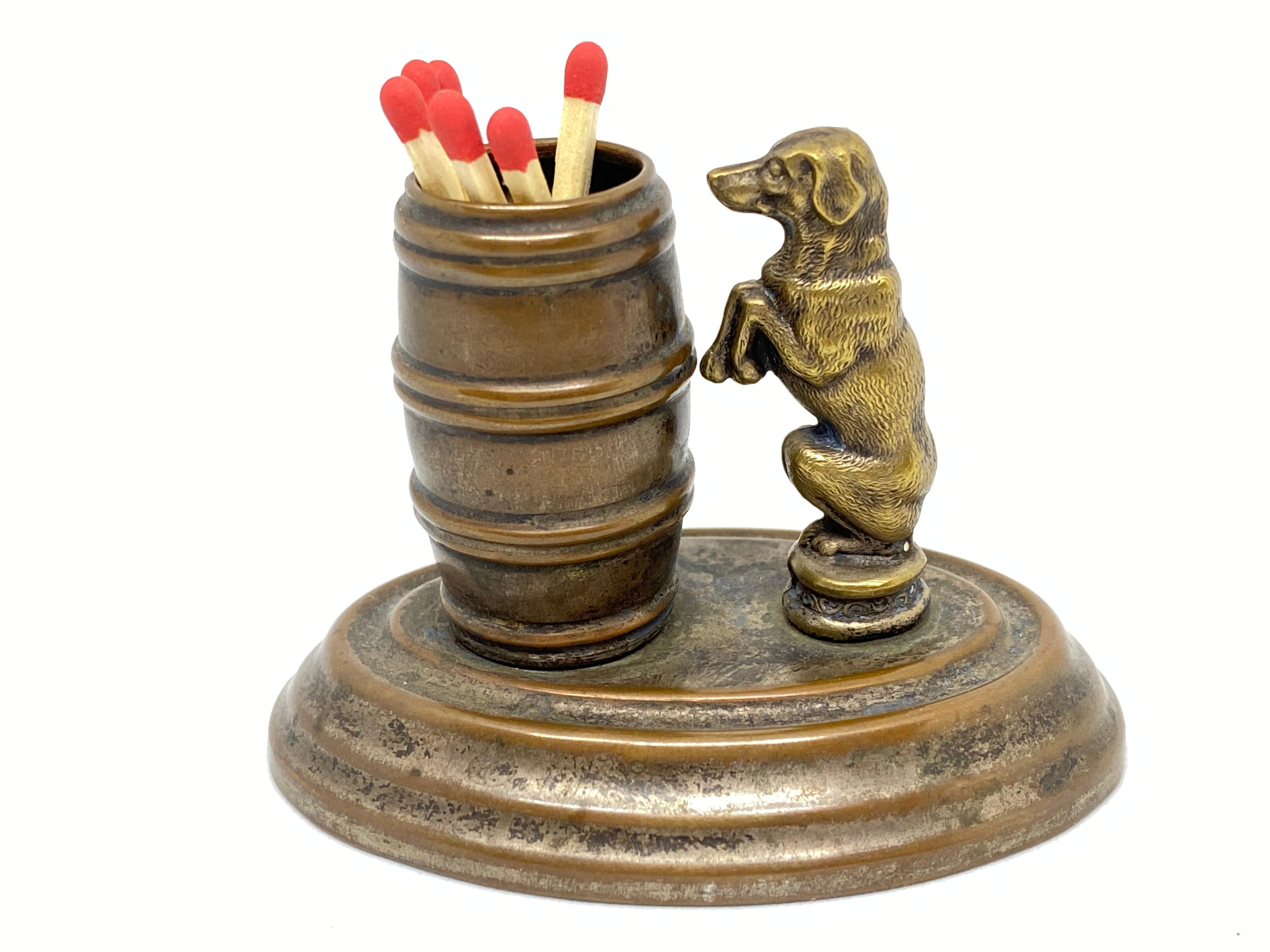 A beautiful figural matchstick holder, circa 1890s, European. Nice addition to every table or just for your collection. Tarnished and a nice patina, but this is old-age and gives this pieces a classy statement.
  
