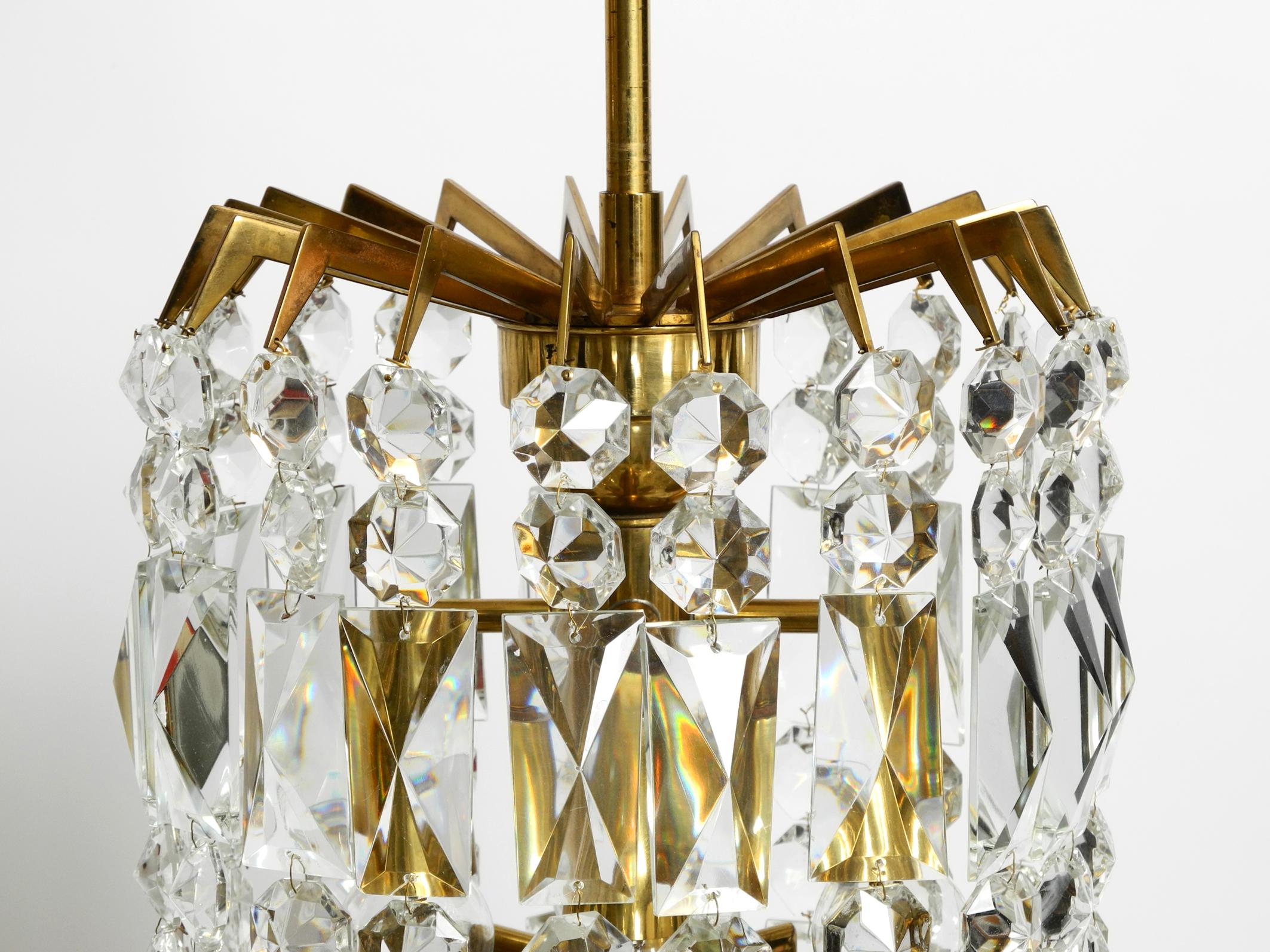 Mid-20th Century Beautiful Midcentury Brass Crystal Glass Chandelier from Vereinigte Werkstätten For Sale