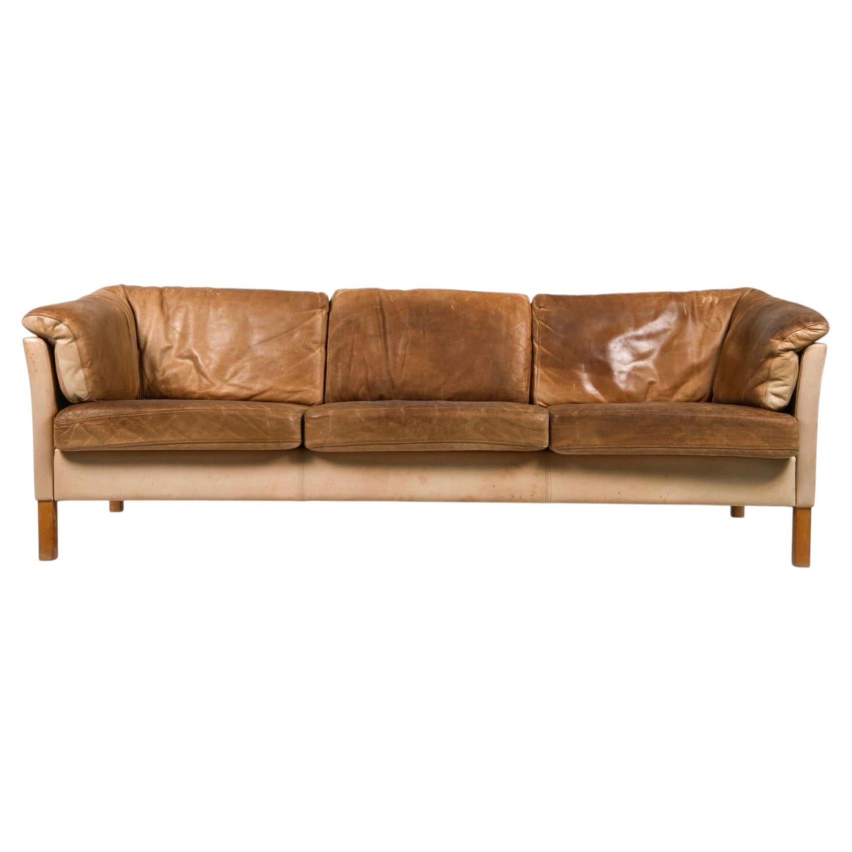 What is a sofa without a back called?