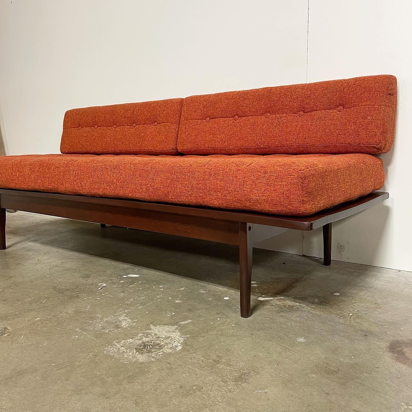 Amazing Mid Century Daybed. 1960’s. This piece is in incredible condition through and through. Vintage Orange tweed new upholstery. The foam in the seat cushion and back rests are brand new and offer a medium density comfort. All buttons are nice