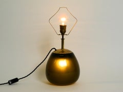 Beautiful Mid Century green glass table lamp by WMF Ikora with two sockets