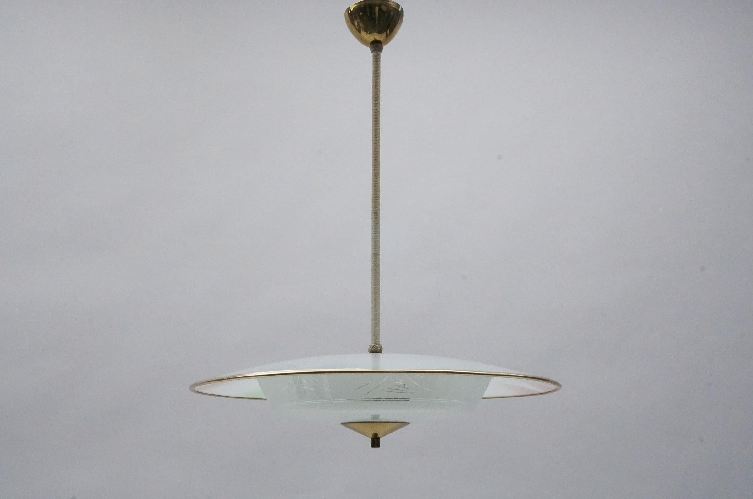 Executed in glass, brass and metal. The lamp needs 2 x E14 / E15 Edison screw fit bulb, is wired, in working condition and runs both on 110 / 230 volt.

Our lamps are checked, cleaned and are suitable for use in the USA.