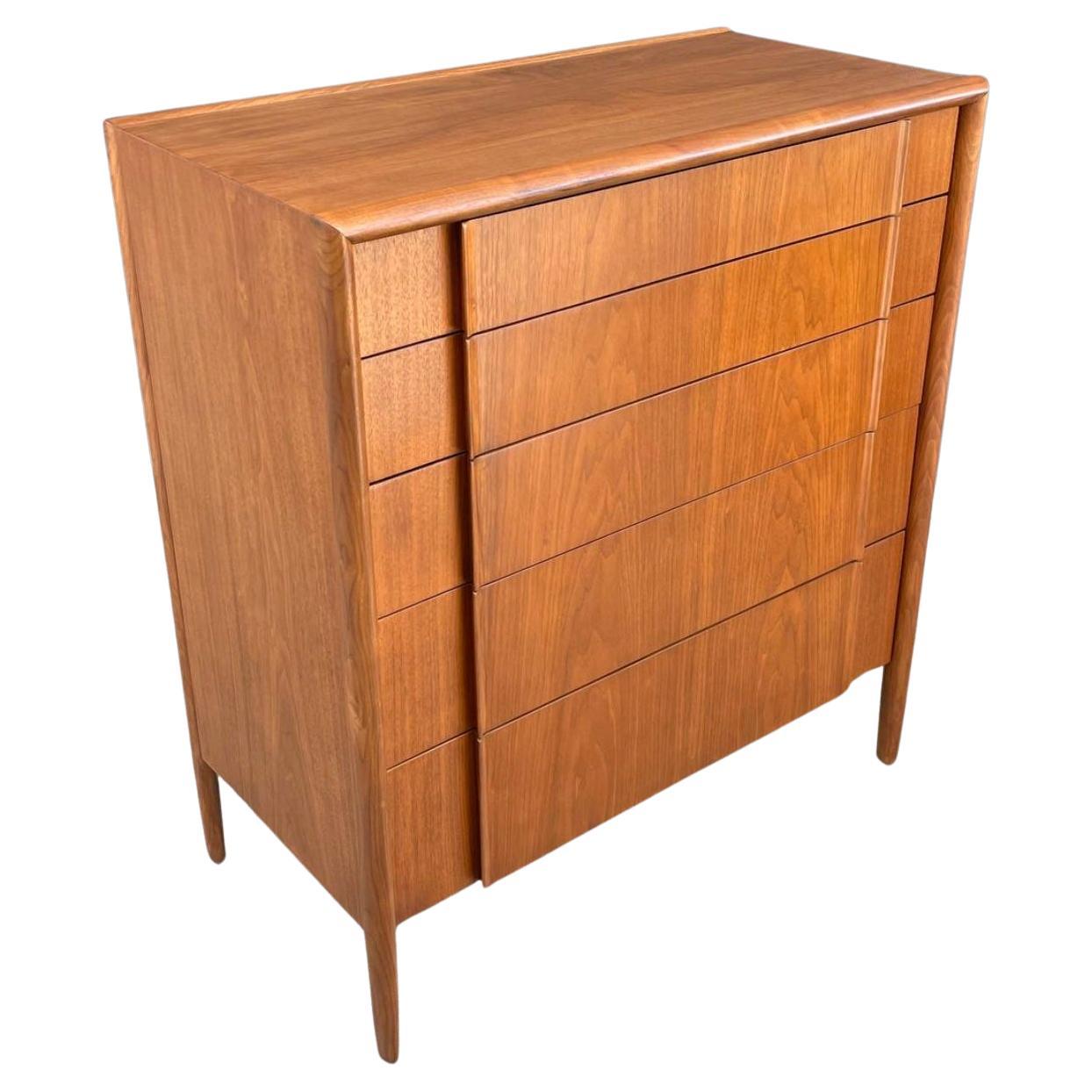 Beautiful Mid Century Modern High boy 5 drawer Dresser by Barney Flagg for Drexel. Clean inside and out labeled in top drawer. Located in Brooklyn NYC.

Dimensions: 42” H x 38” W x 20” D
