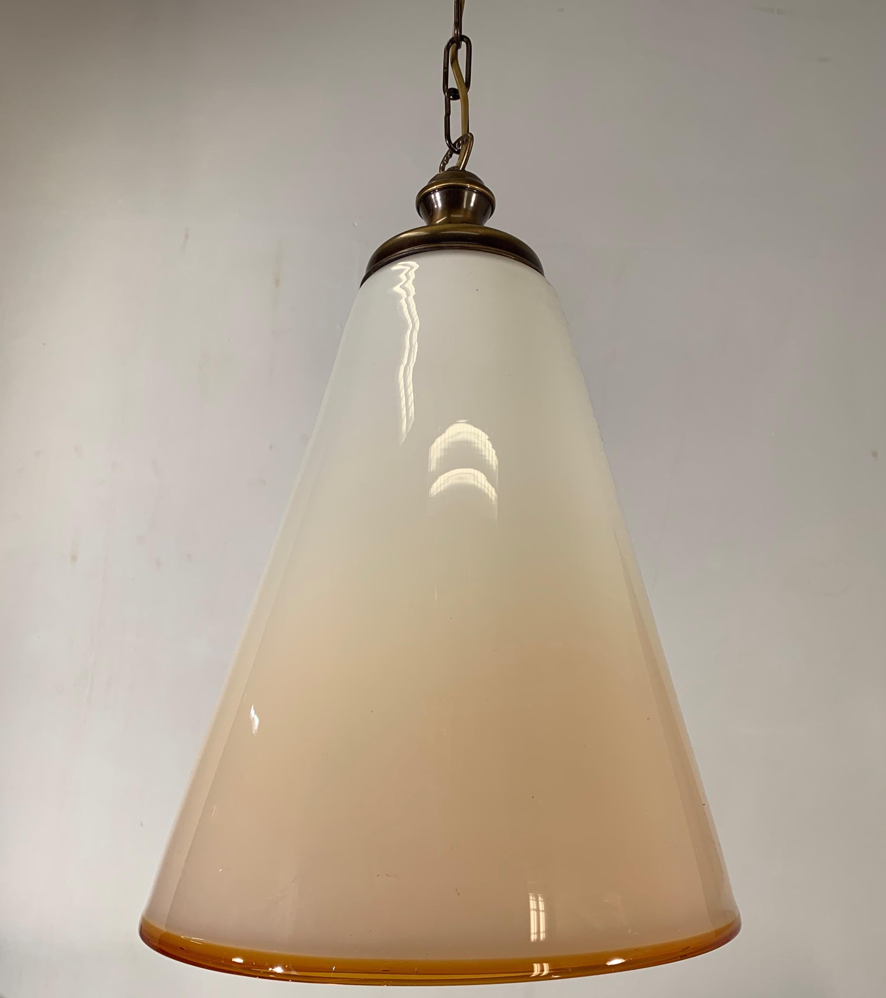 Great shape, mouthblown Venetian light fixture by Seguso.

This large size Murano glass pendant from the 1960s is a truly exquisite ligh fixture and she is in very good and original condition. The slightly rippled surface gives this stunning fixture