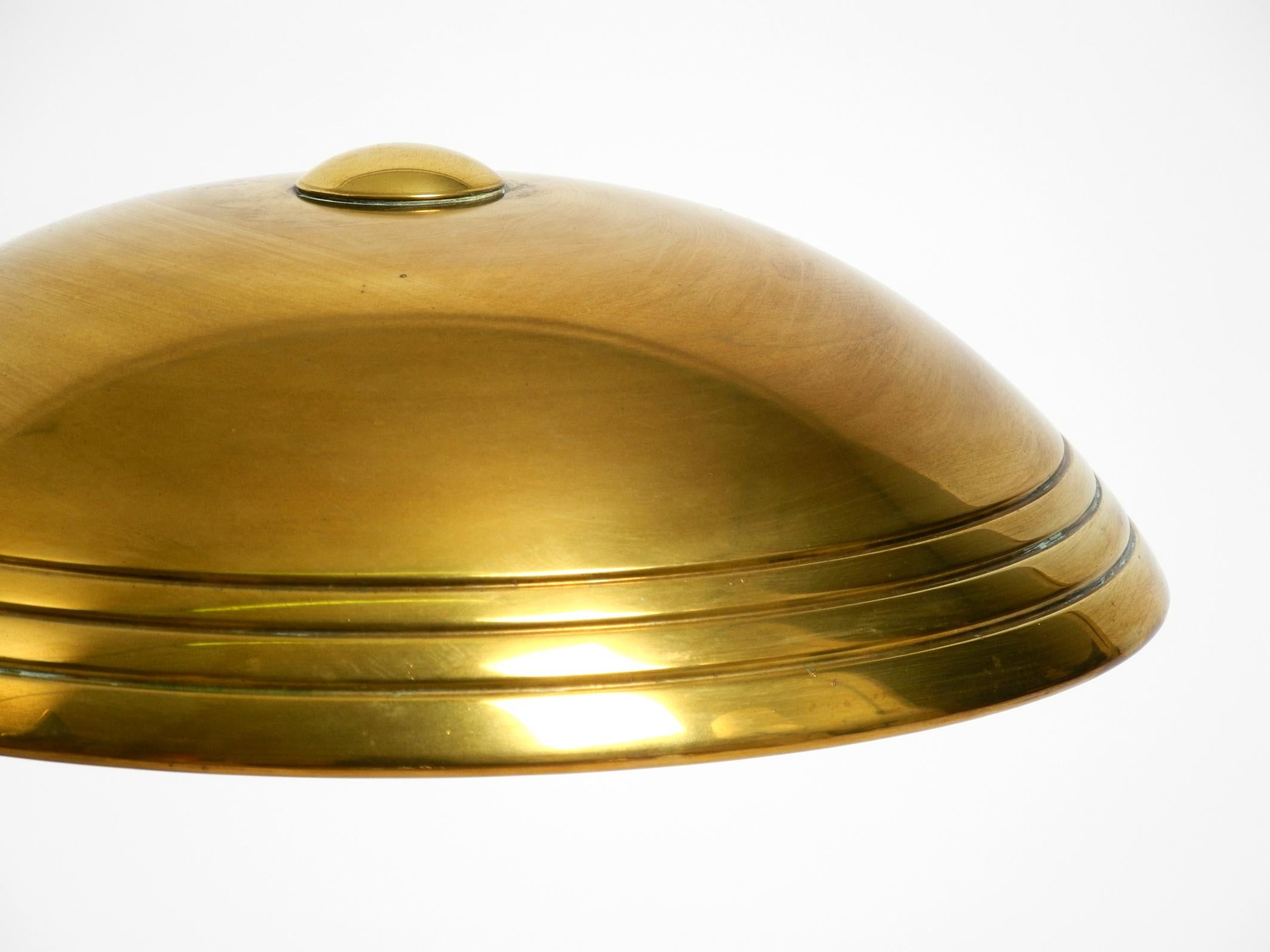 Beautiful Mid Century Modern table lamp by Helo made of shiny brass 6