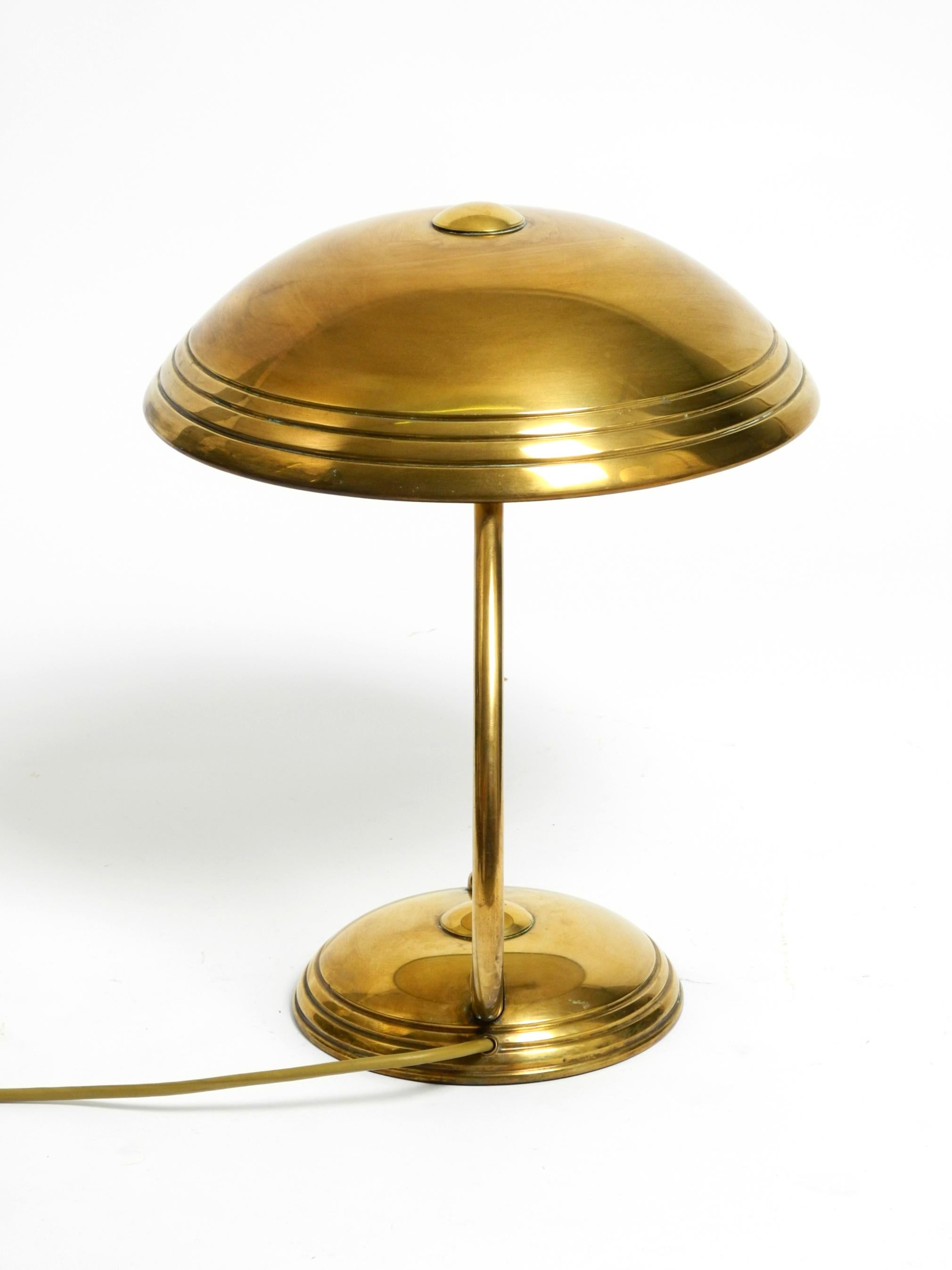 Beautiful Mid Century Modern table lamp by Helo made of shiny brass 8