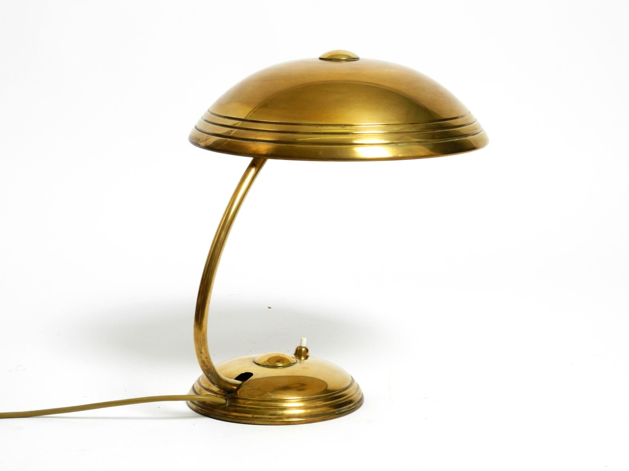 Beautiful Mid Century Modern table lamp by Helo made of shiny brass 9