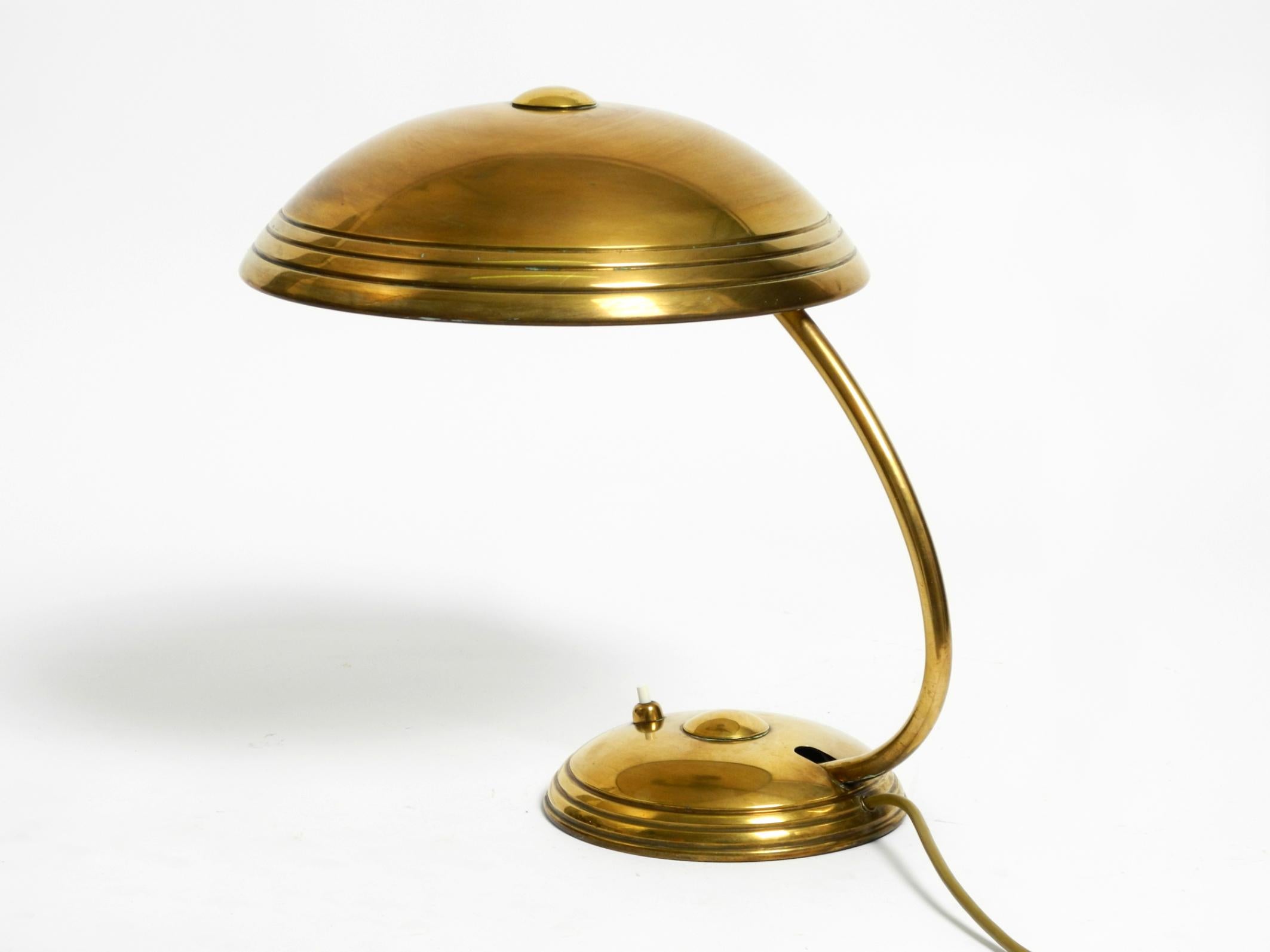 Mid-Century Modern Beautiful Mid Century Modern table lamp by Helo made of shiny brass