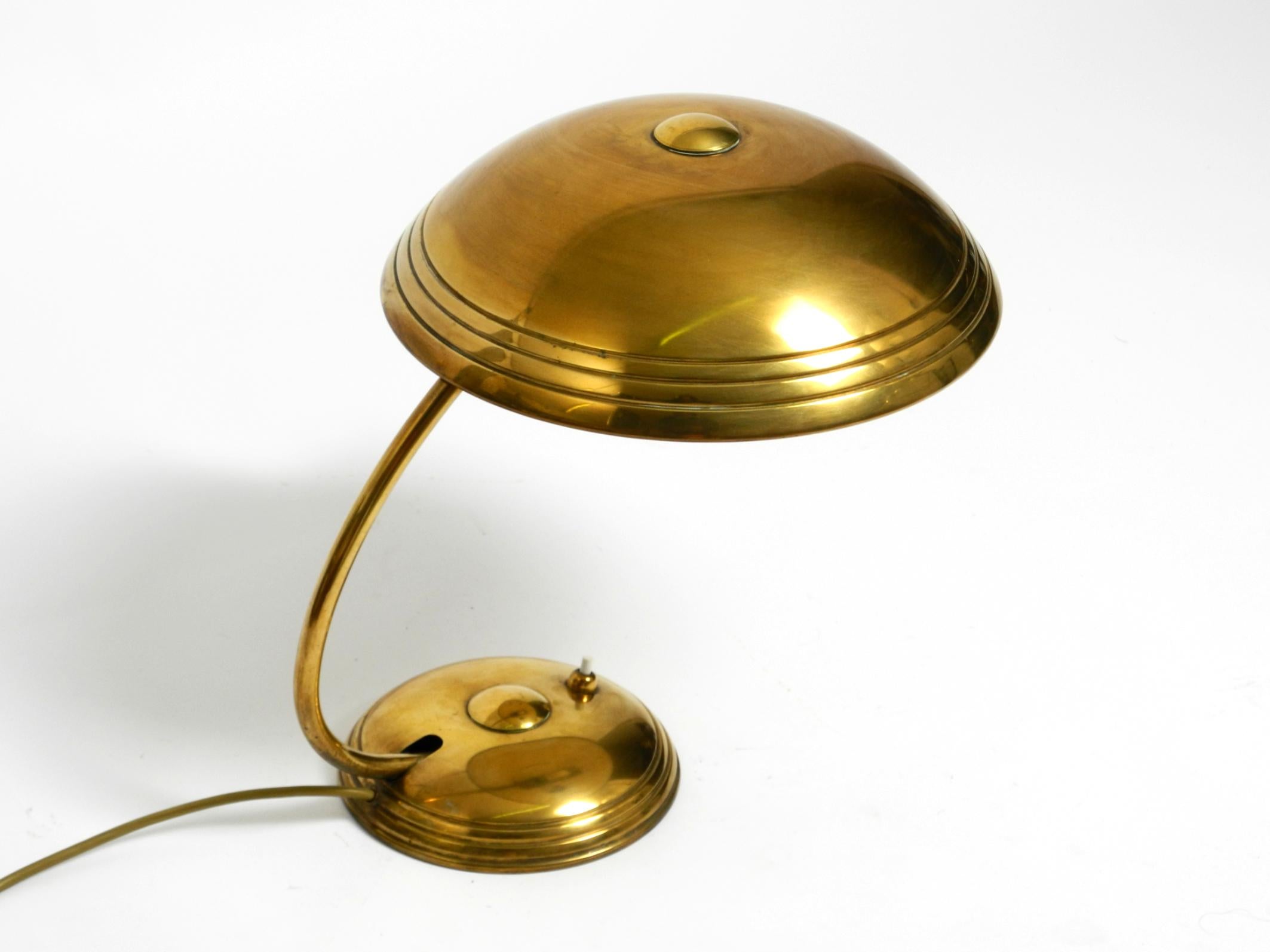 German Beautiful Mid Century Modern table lamp by Helo made of shiny brass