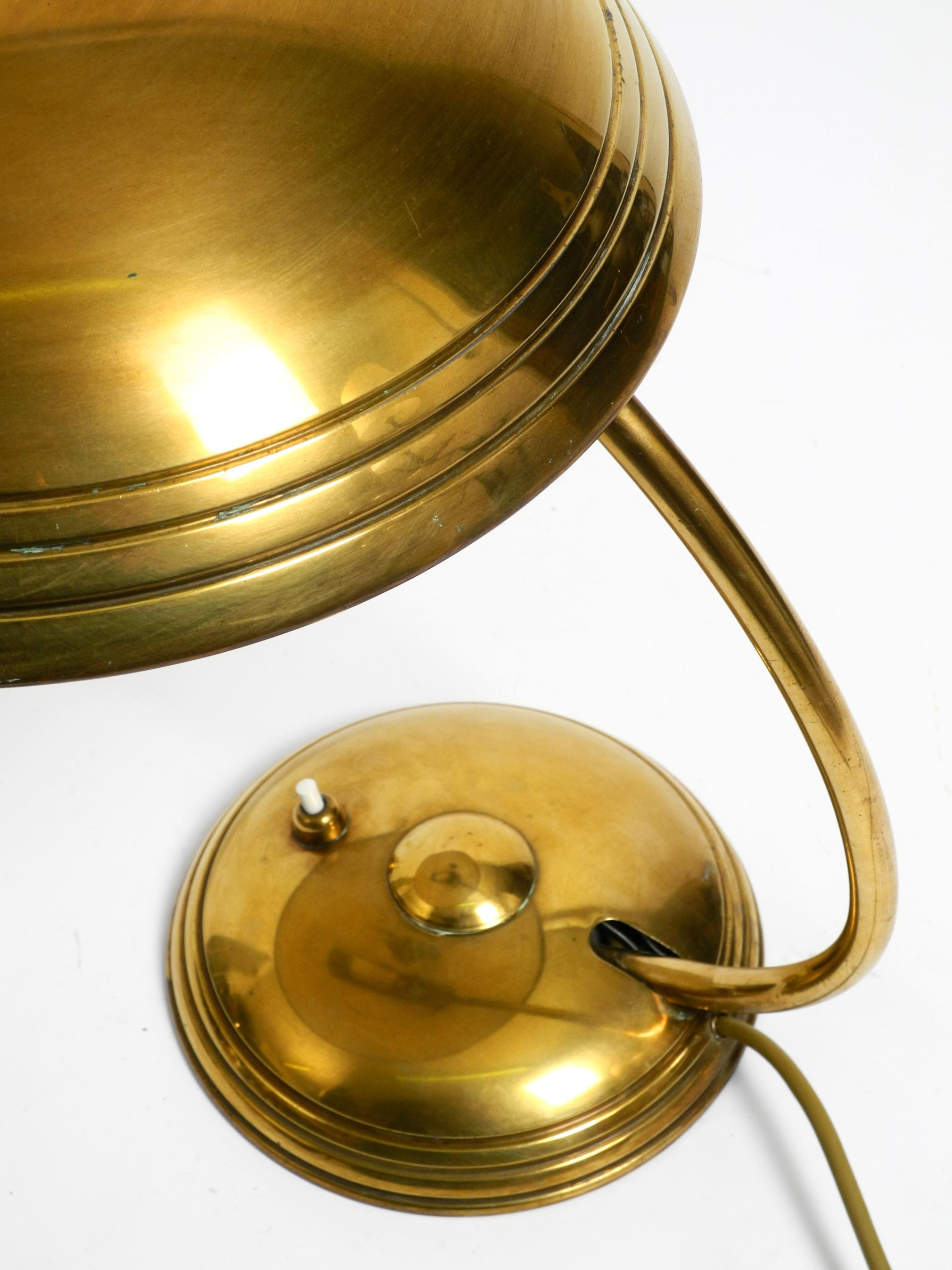 Brass Beautiful Mid Century Modern table lamp by Helo made of shiny brass