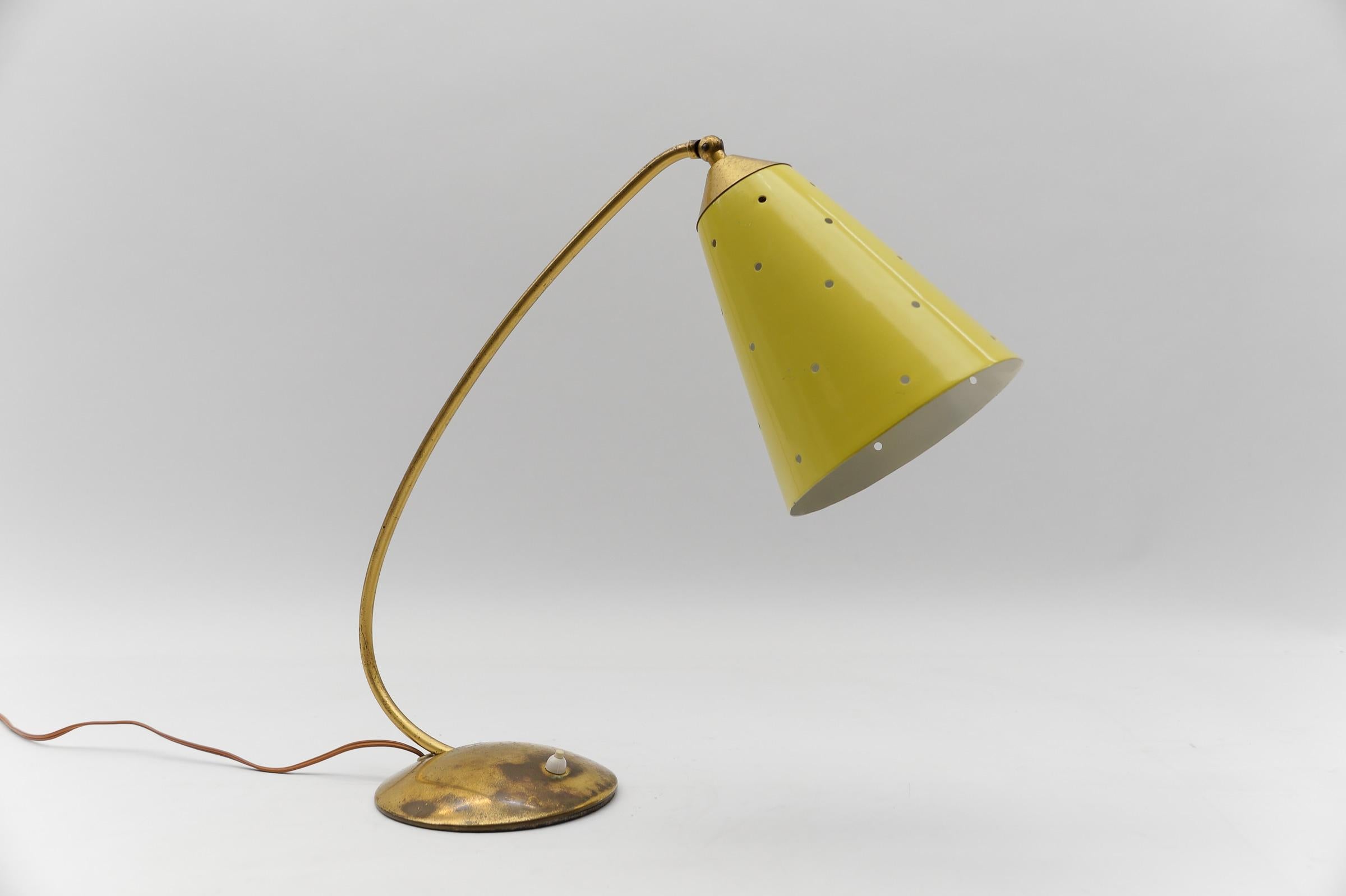 Lovely Mid-Century Modern Table Lamp in Brass, 1950s

The lamp needs 1 x E14 / E15 Edison screw fit bulb, is wired, and in working condition. It runs both on 110 / 230 volt.

Very elegant and cute at the same time.

Light bulbs are not included.

It