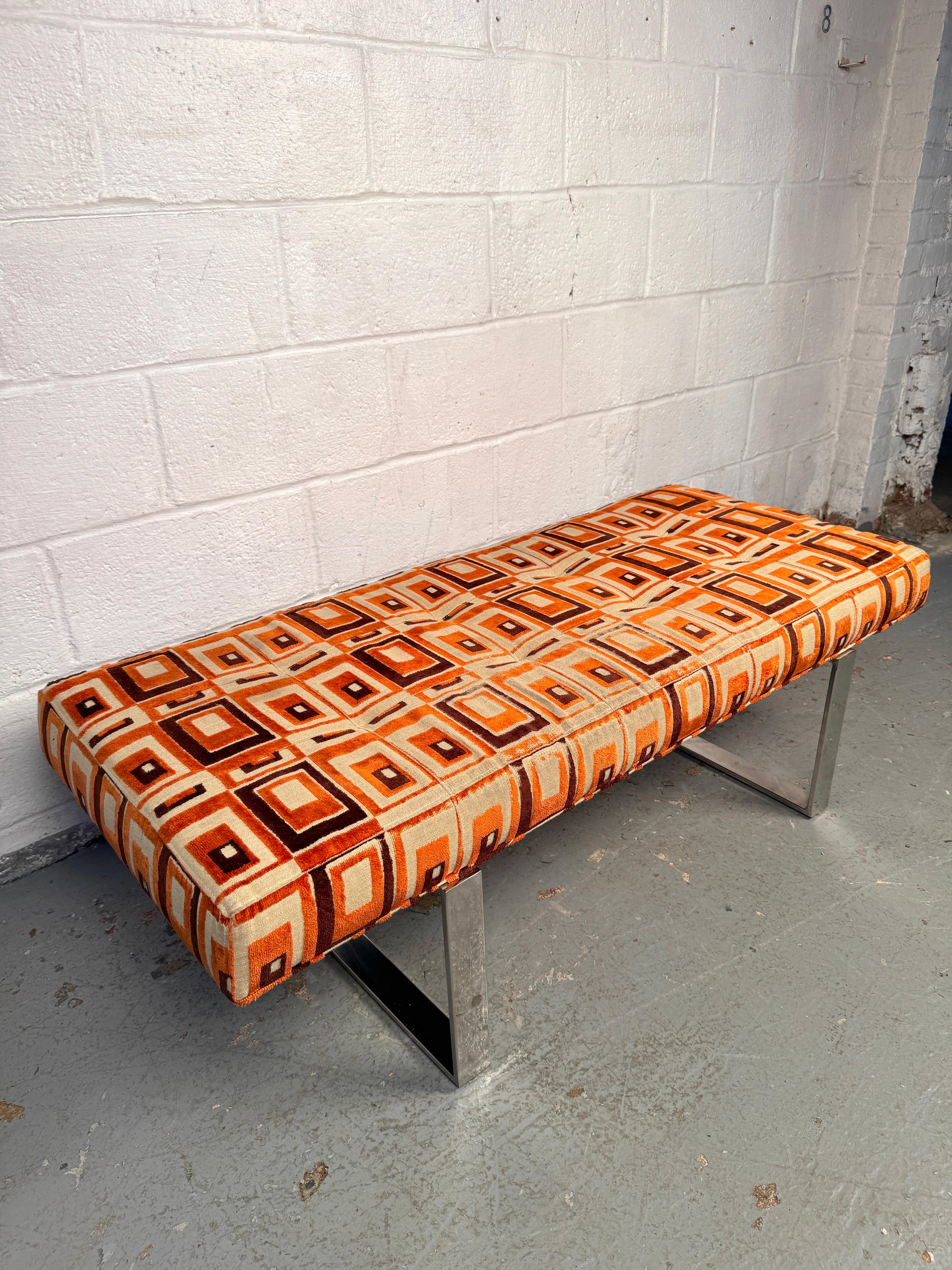 Chic mid-century modern bench with a streamlined frame and upholstered seat, balancing comfort with elegant simplicity. Its versatile design makes it ideal for use at the foot of a bed, in an entryway, or as accent seating. A stylish and functional