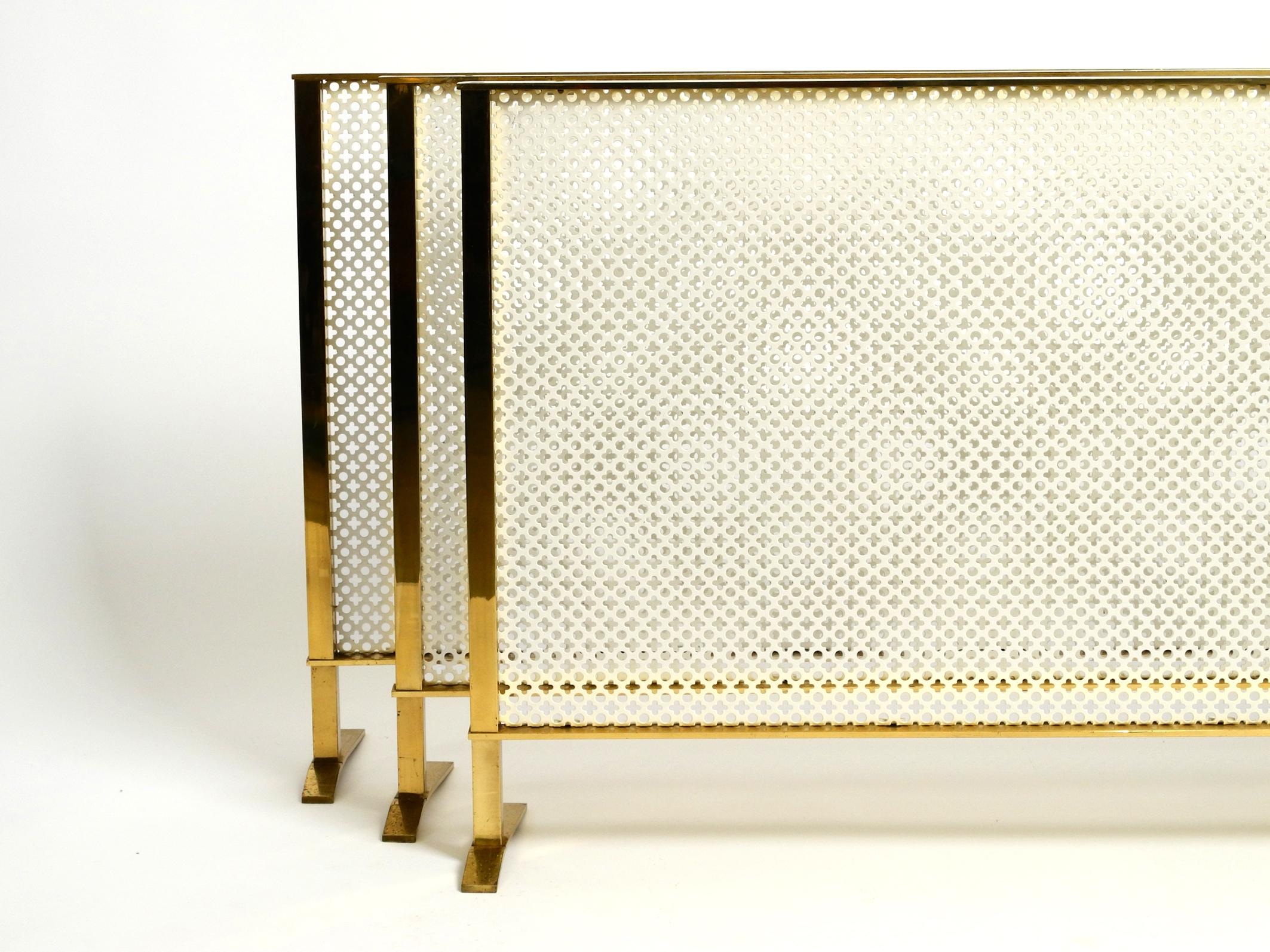 Mid-Century Modern Beautiful Mid Century Radiator Covering Made of Brass and Perforated Sheet Metal For Sale
