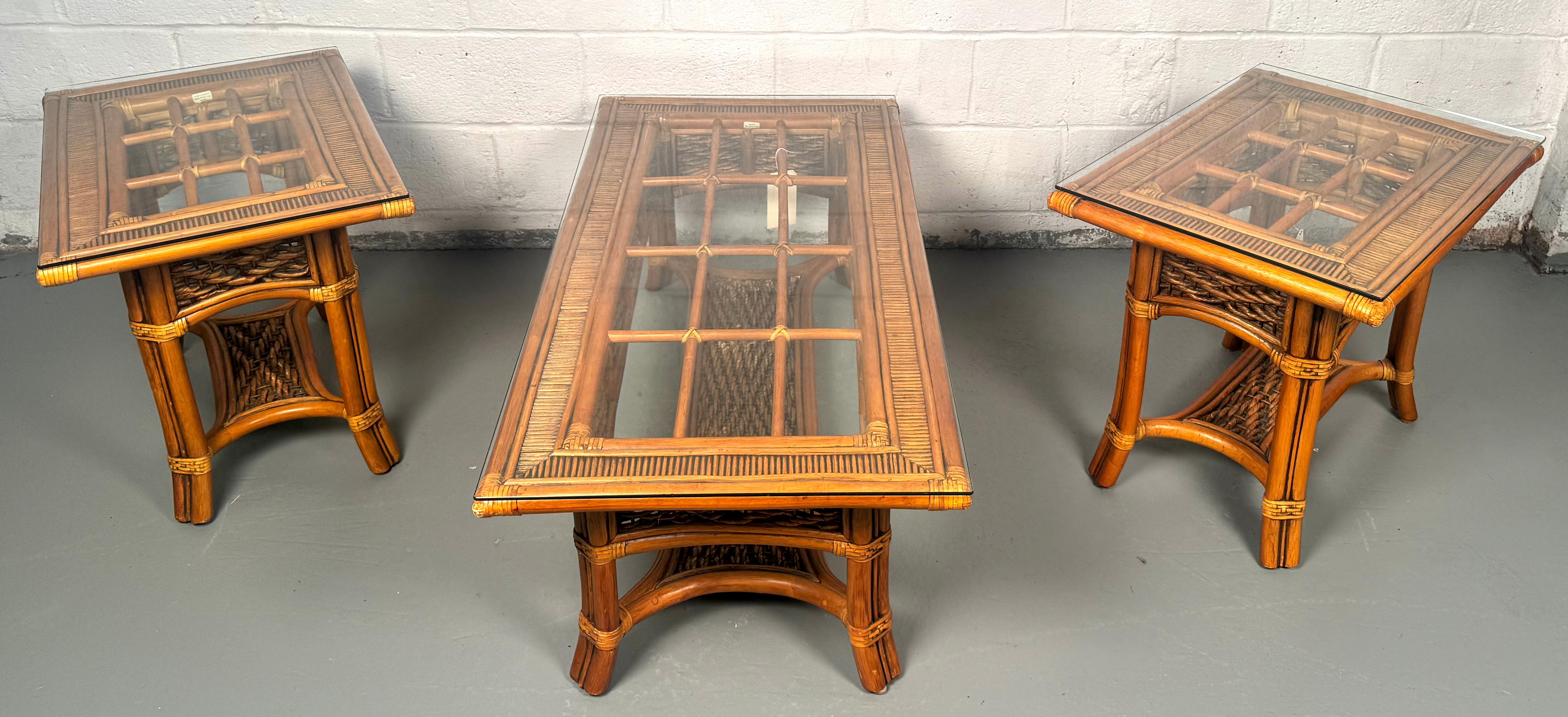 Bring a breezy, resort-inspired ambiance into your home with this elegant Palm Springs collection set—a vintage rattan and glass coffee table paired with coordinating end table(s). Perfectly capturing mid-century California flair, this duo blends