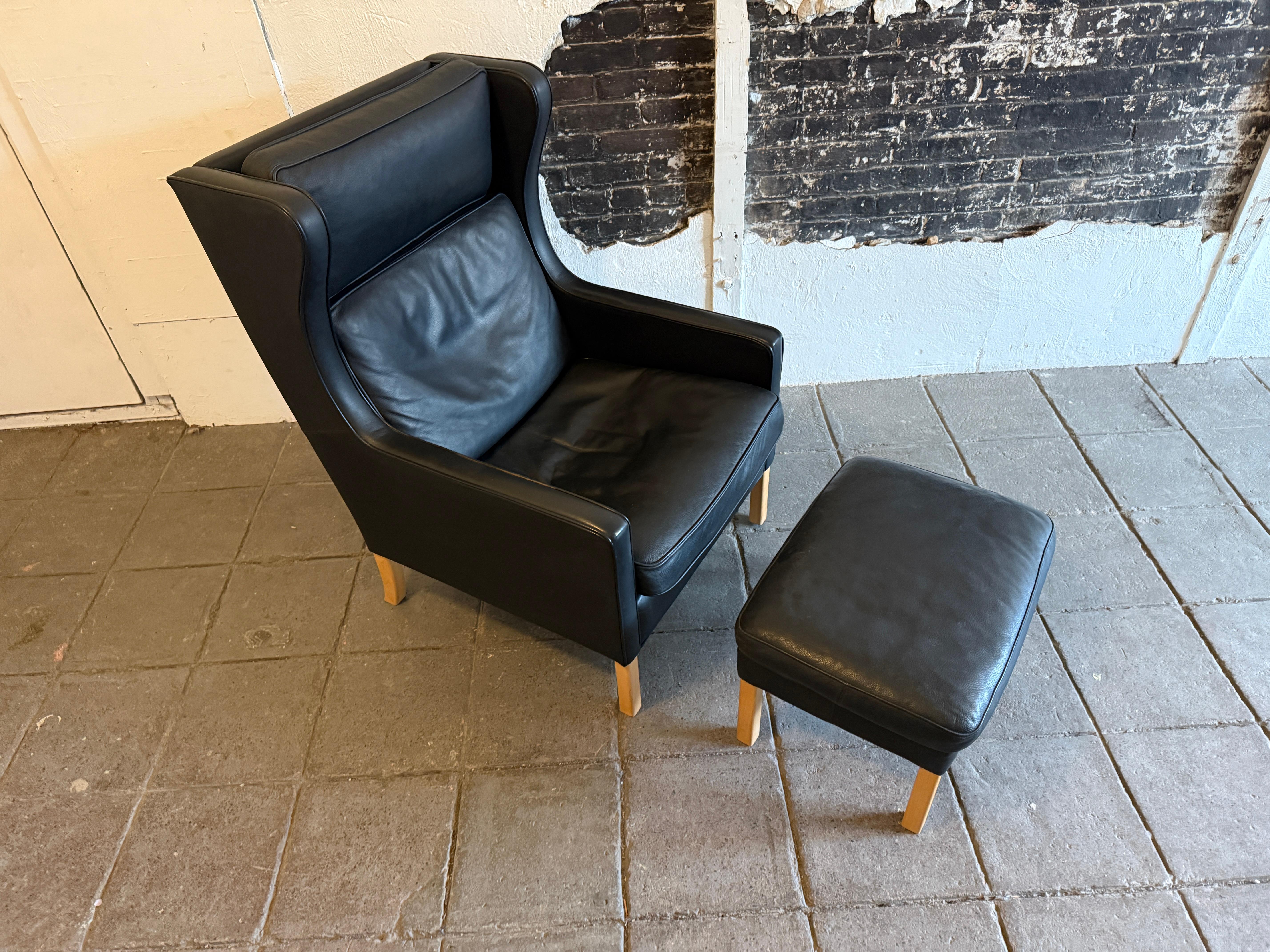 Scandinavian Modern Beautiful Mid Century Scandinavian modern Black Leather Wingback Chair Ottoman For Sale
